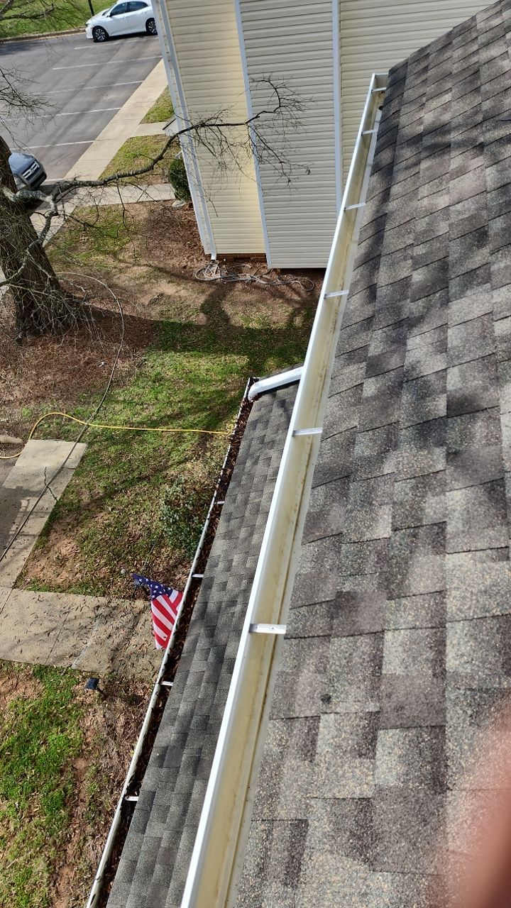 Gutter Cleaning using water by Power Wash Masters LLC