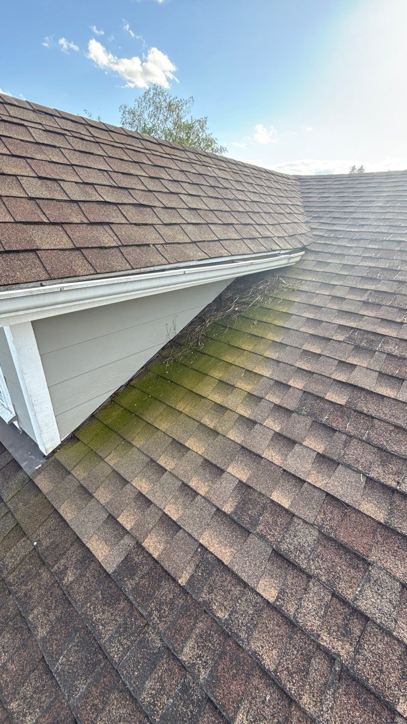 Glacier Roof Replacement with Metal Accents by Orezona Building & Roofing Company, Inc.