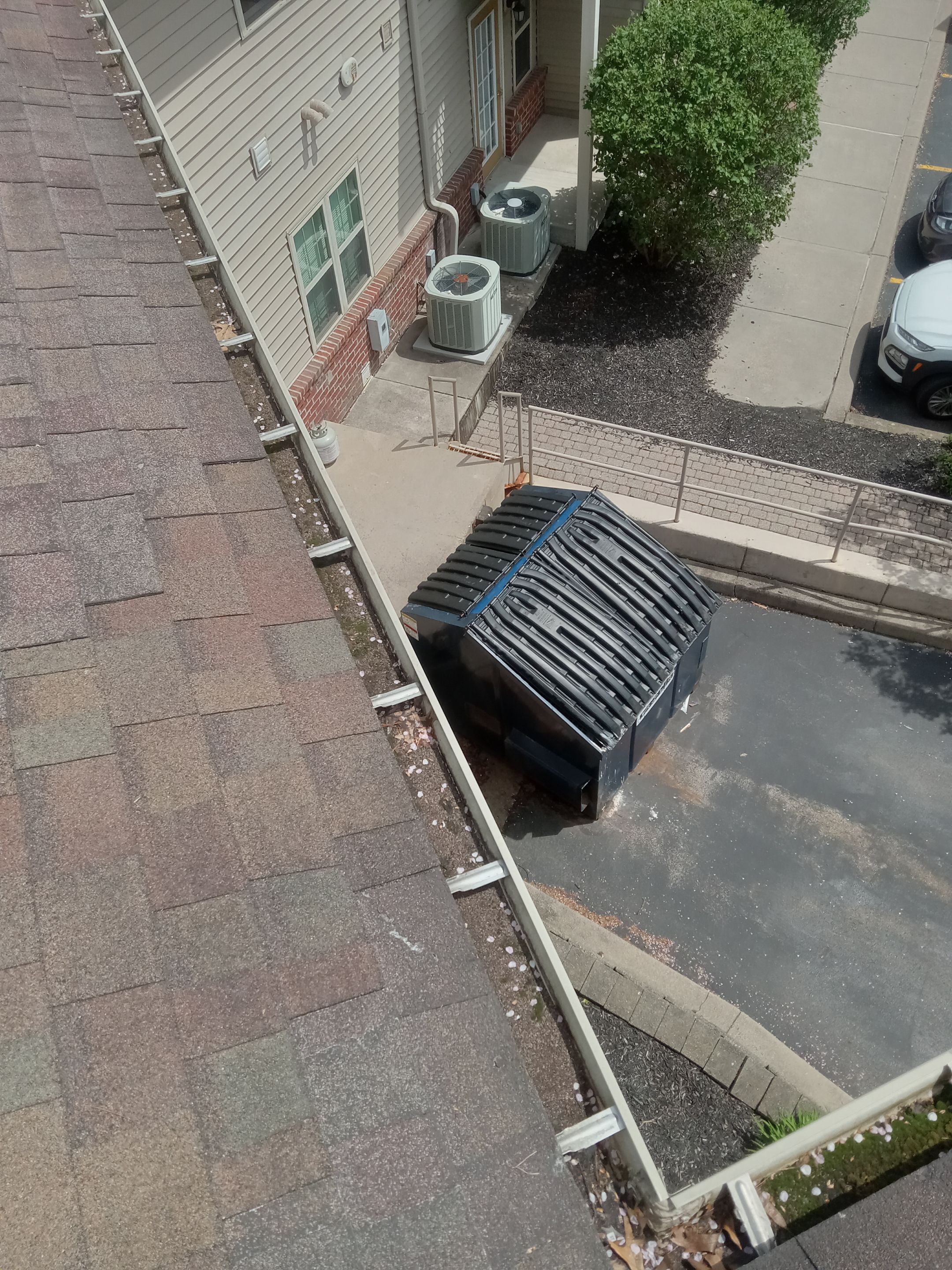Commercial gutter cleaning Avon, NY before photo with filled gutters