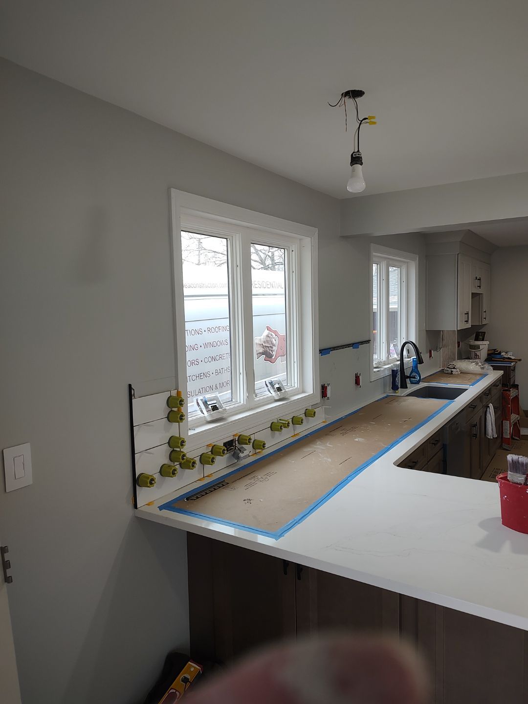 Interior Renovations, Kitchen Remodel, and Window Replacement by Ivy Lea Construction