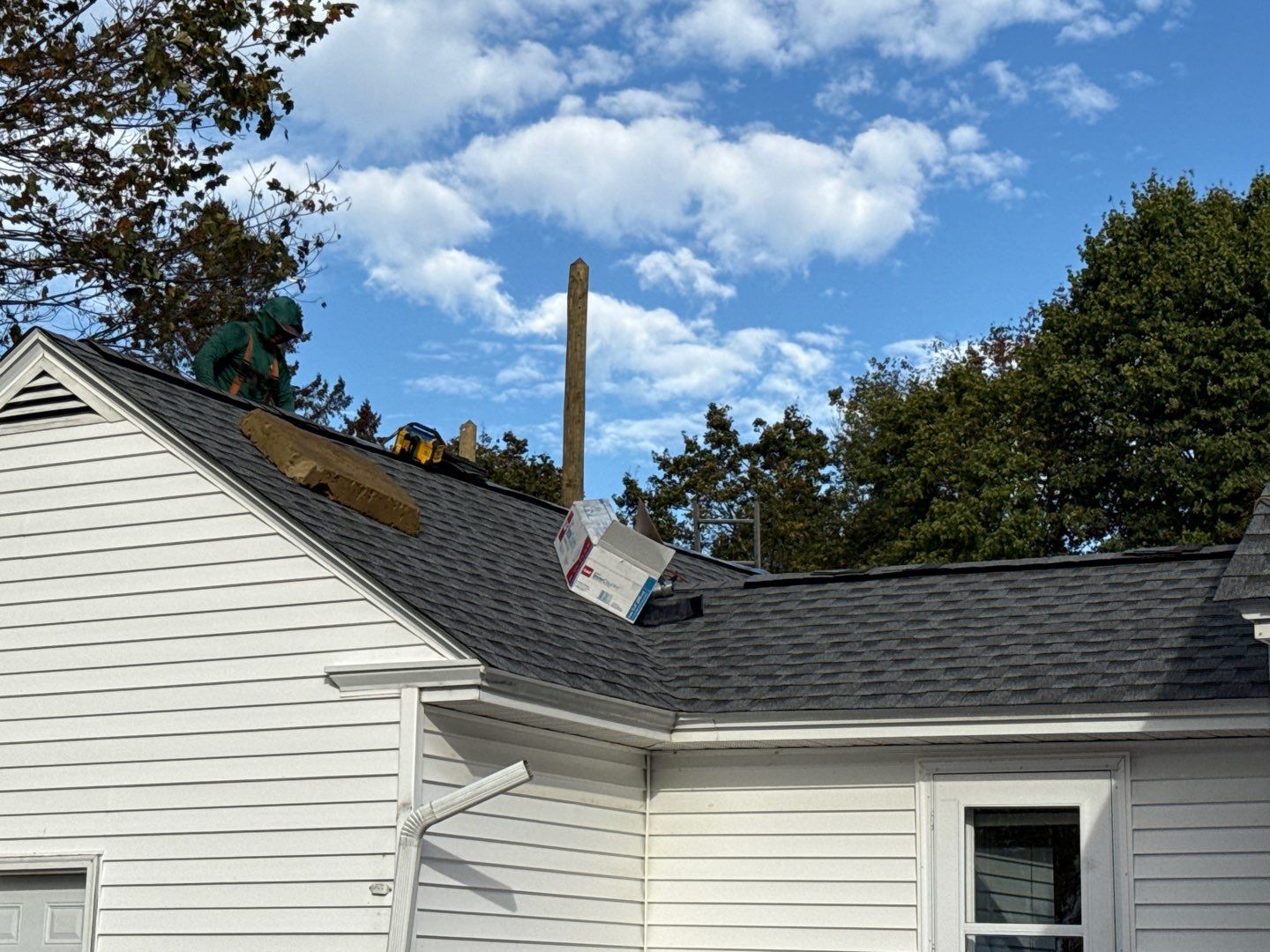 Complete Roof Replacement with GAF Pewter Gray HDZ™ Shingles, VELUX Skylights & New Gutters by Sensible Home Solutions