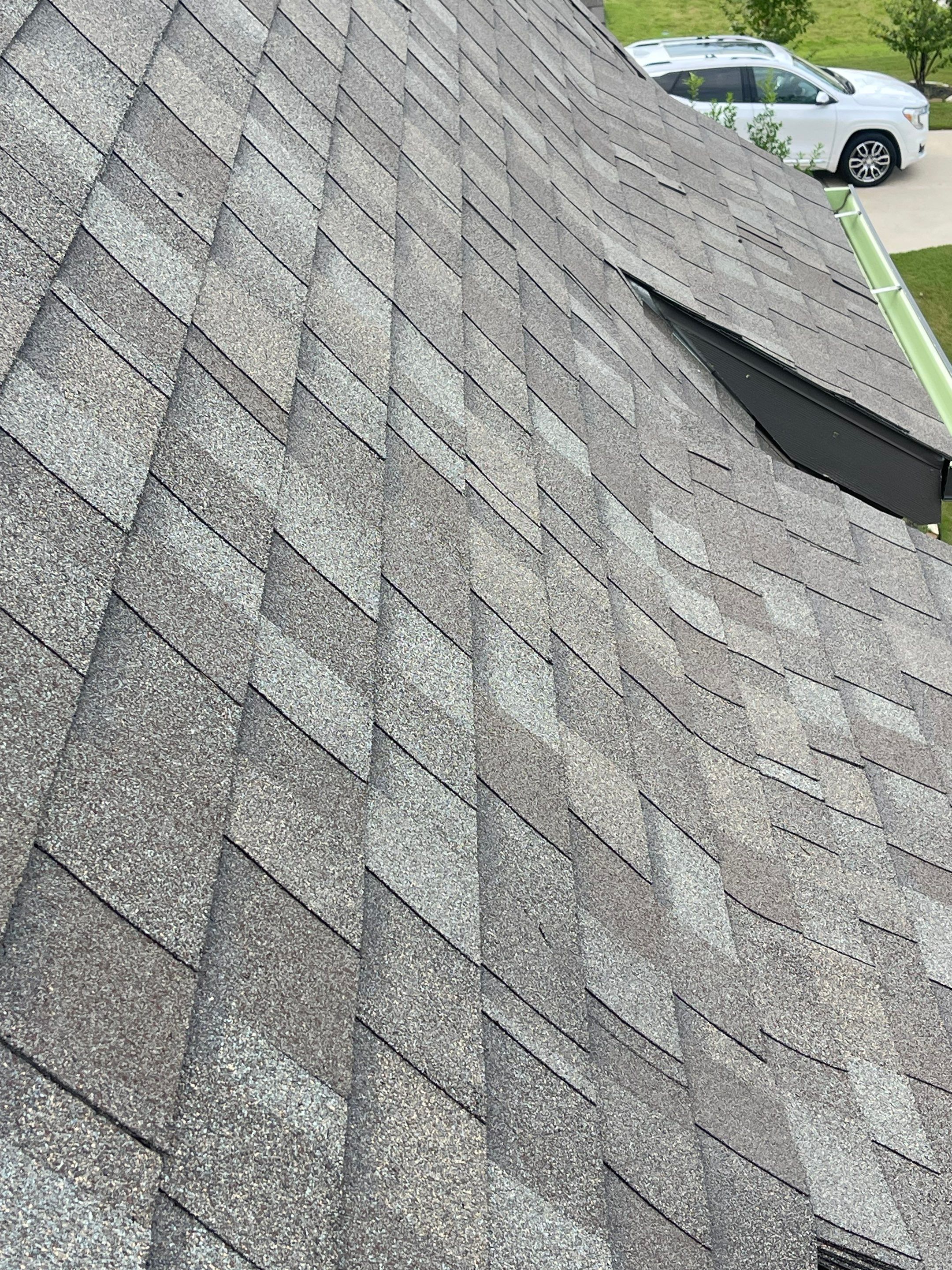 Hail Damage using Owen's Corning Duration (Lifetime) Shingles by Roof Repair Company