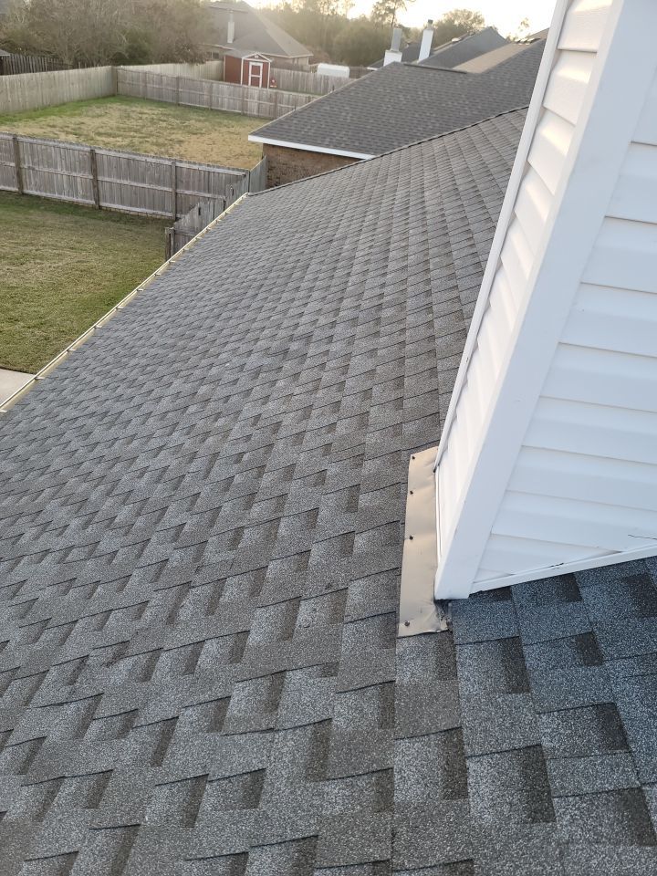 Residential Roofing Installation using Roof Replacement by American Roofing & Construction LLC