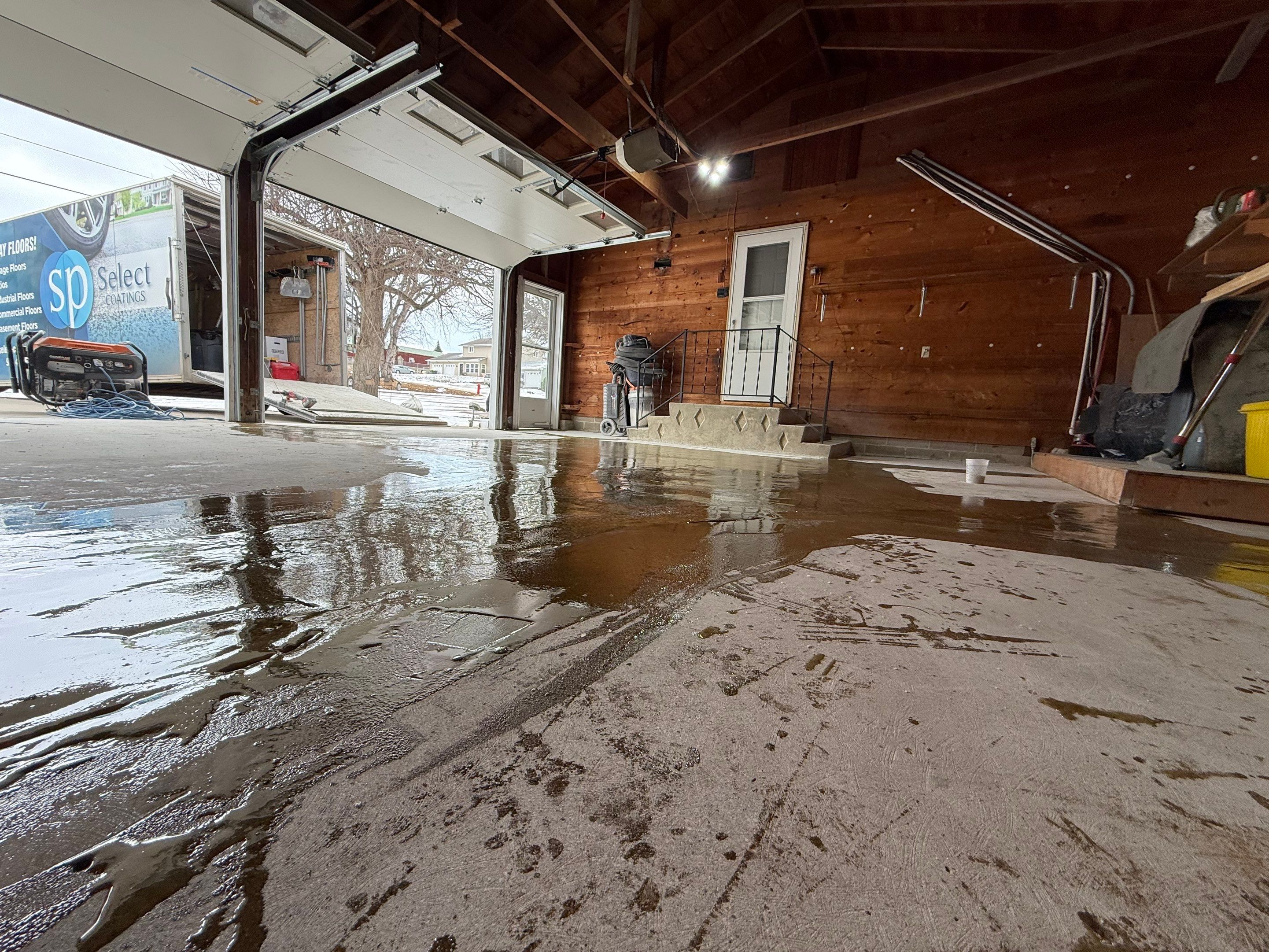 Multi-Colored Epoxy Garage Floor Coating and Concrete Stair Restoration by Select Painting, Coatings & Garage Cabinets