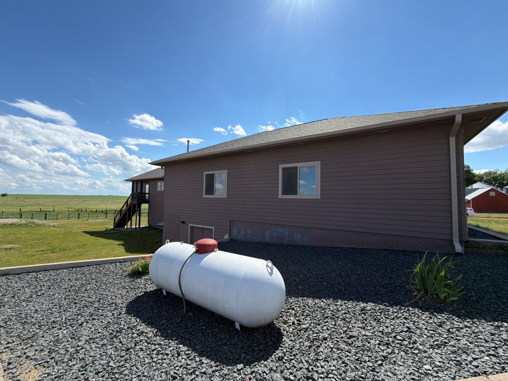Full Exterior Siding Paint Restoration and Refresh in Garretson by Select Painting, Coatings & Garage Cabinets