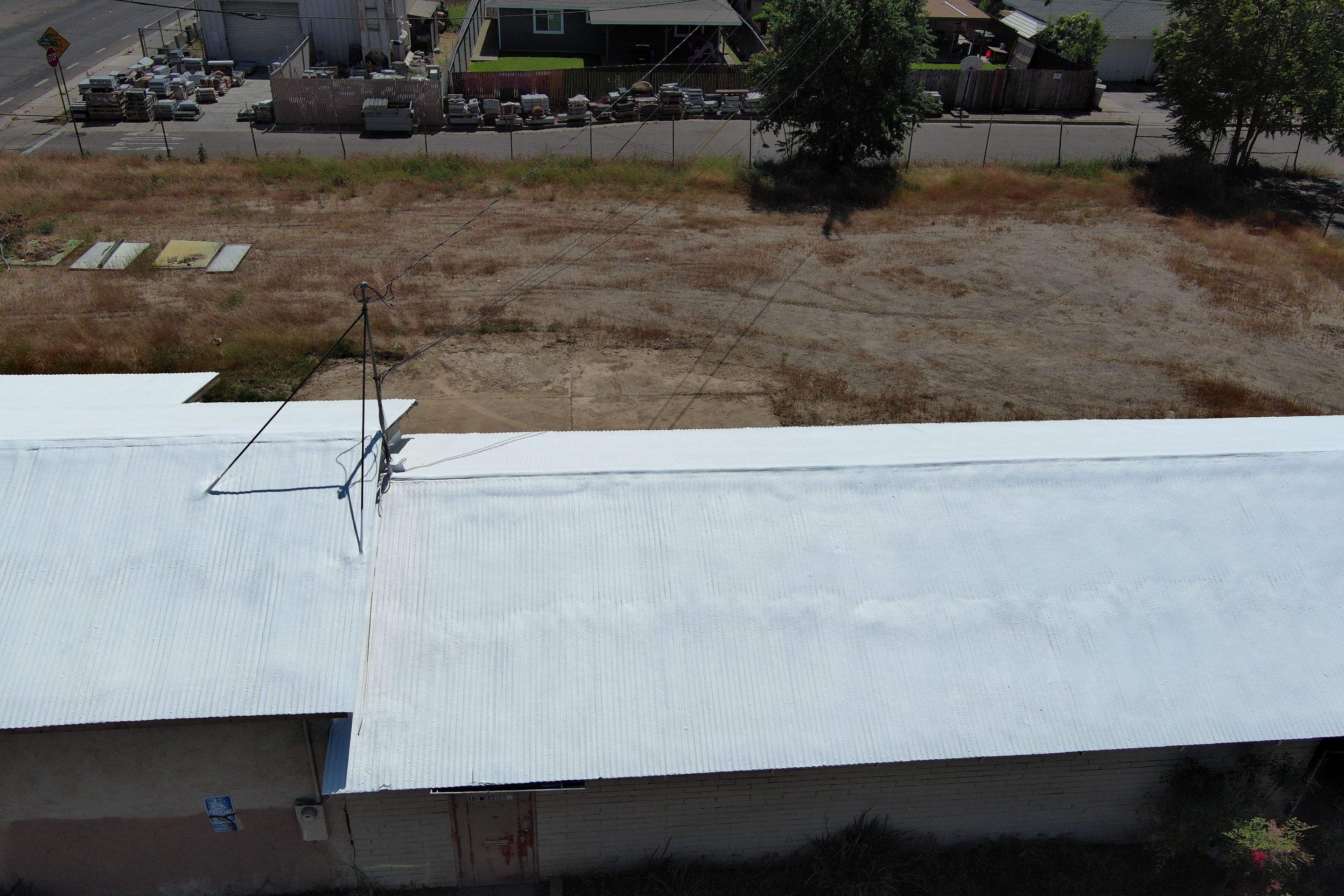 Spray foam and coatings using Conklin Benchmark/PUMA XL by Straight Edge Roofing Inc