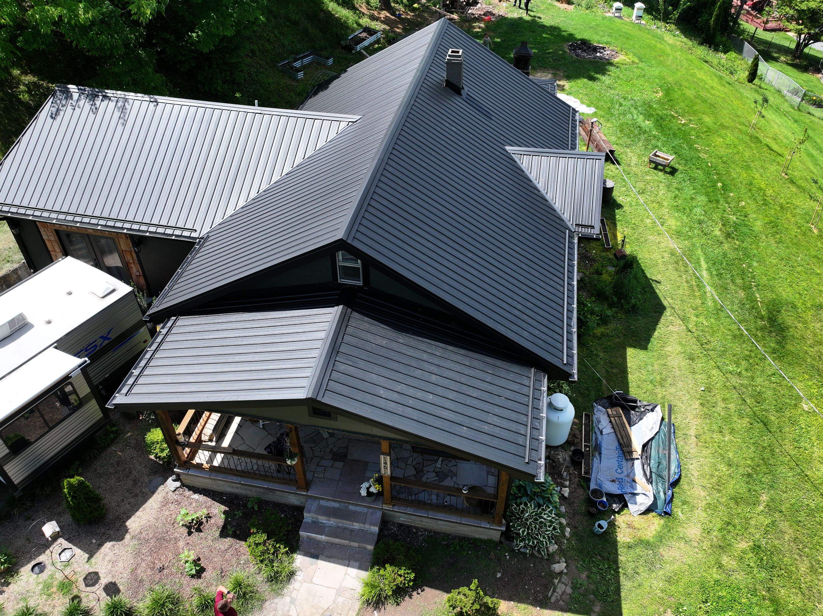 Textured Black Metal Roof by Omnia Roofing