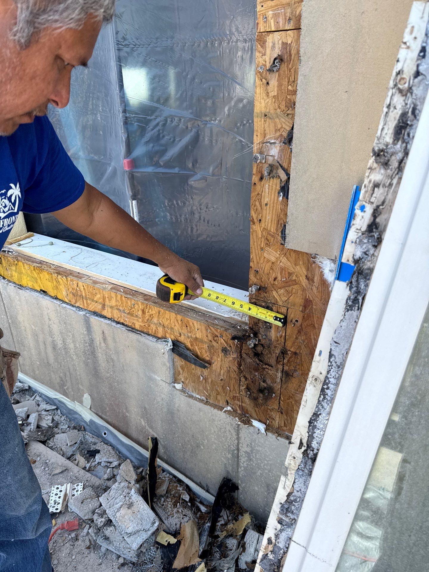 Installing Windows on a Submarine  by Bayfront Roofing and Construction