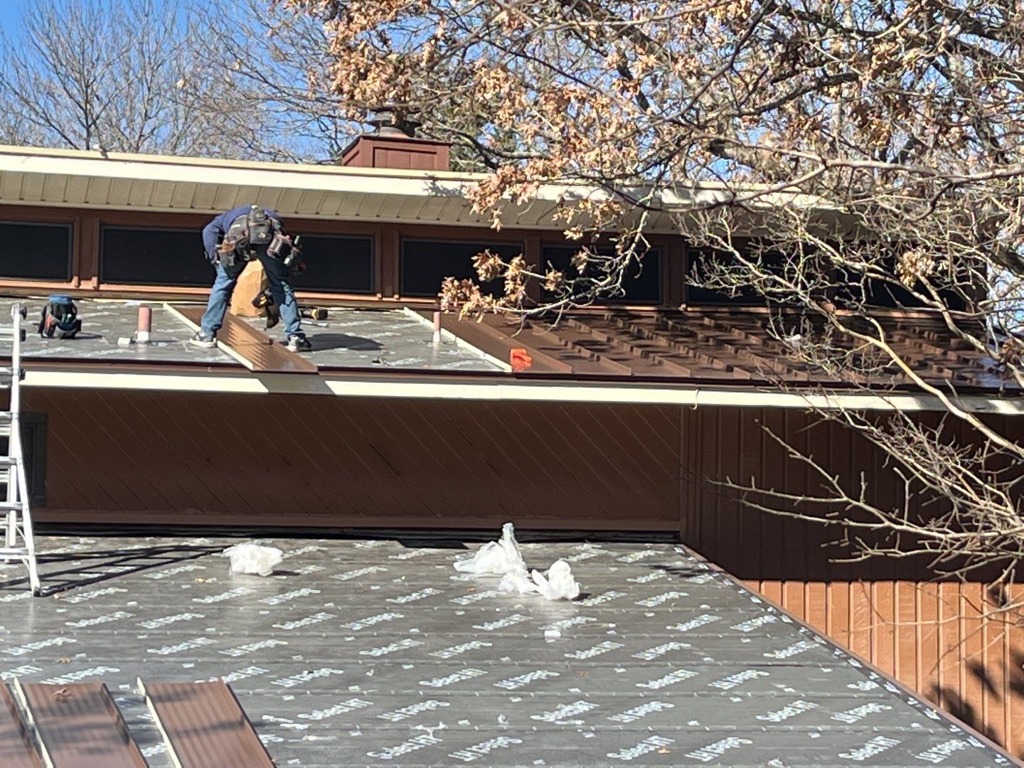 Residential Roofing Installation using Standing Seam Metal Roofing and Composition Shingles by Rainy Day Restoration