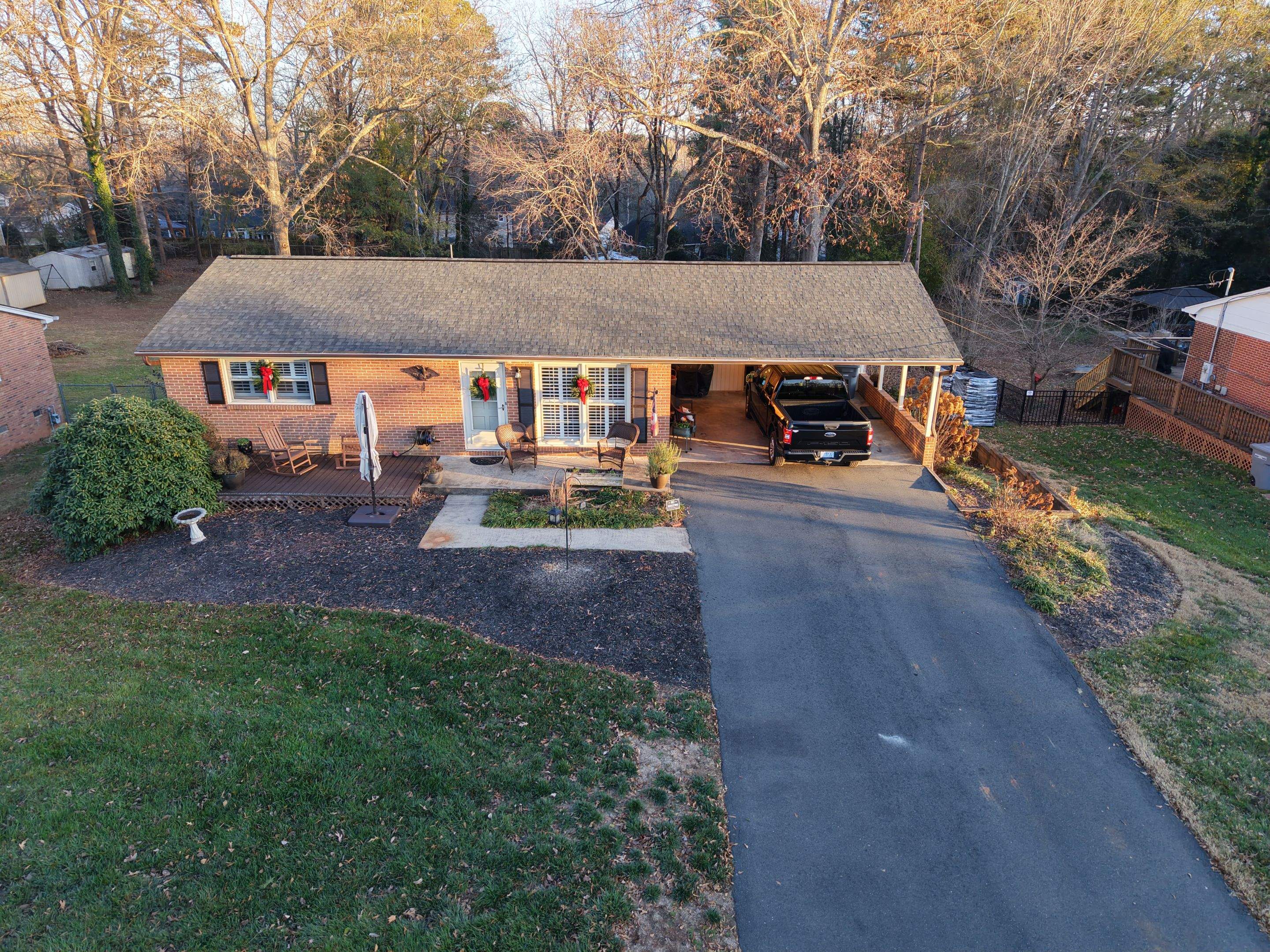 Residential Roof Replacement using TAMKO TItan XT Rustic Black by RISE Roofing & Restoration, LLC