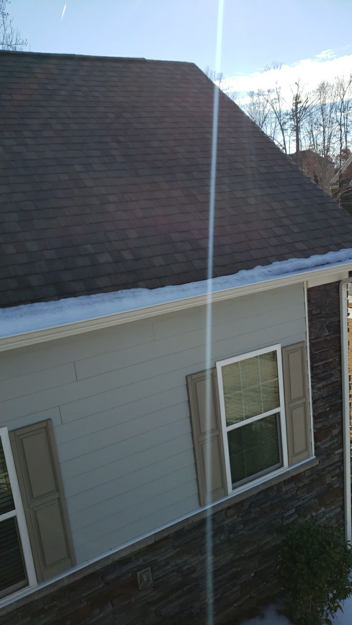 Gutter Cleaning using water by Power Wash Masters LLC
