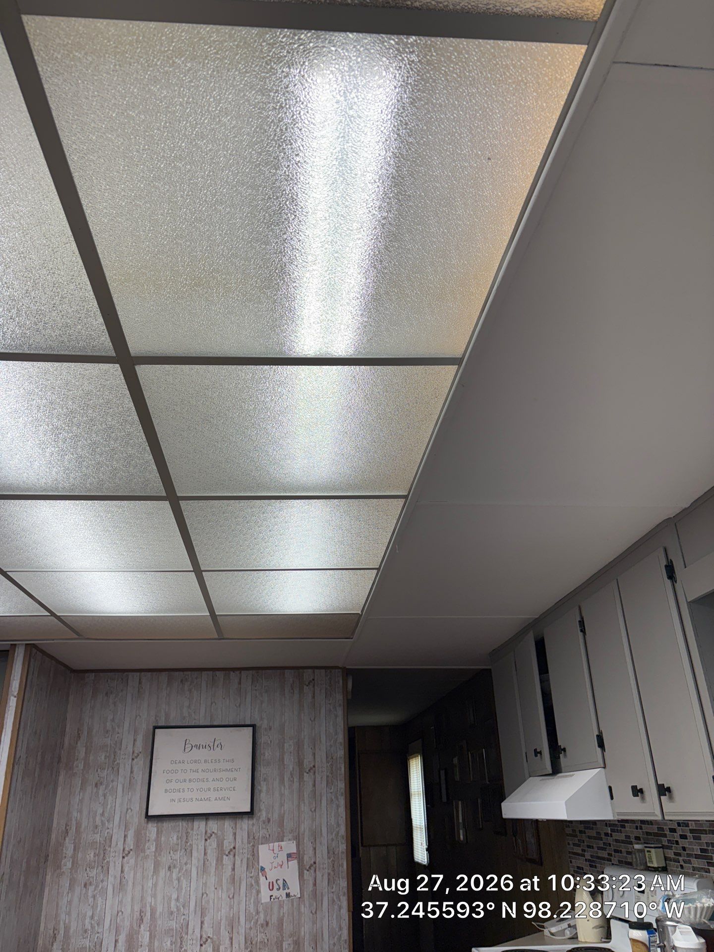 Kitchen Remodel Featuring Gray Cabinetry and Wood-Look Flooring by CompanyCam Sales Demo