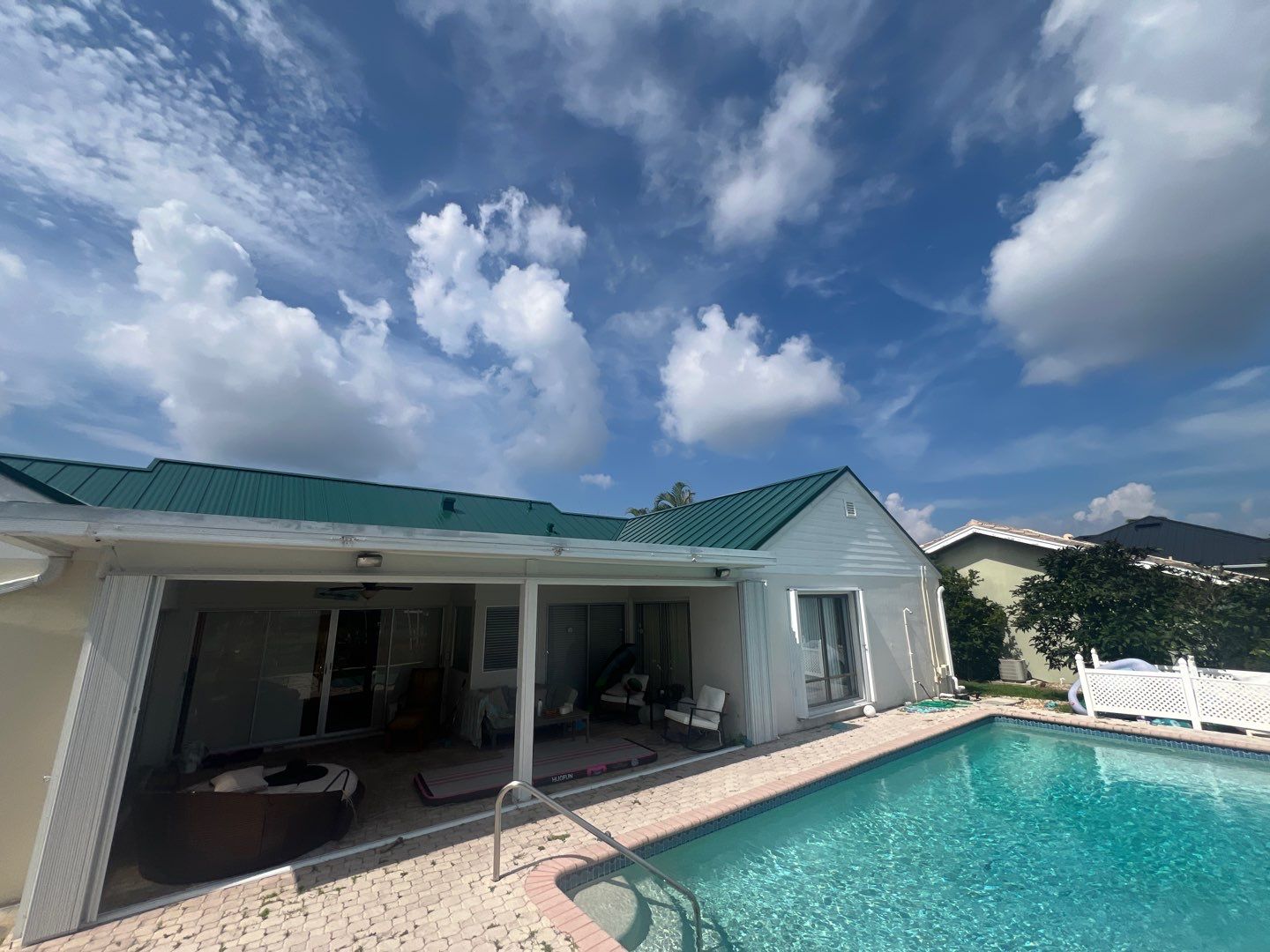 Residential Roofing Installation using Gulf Coast Metals Gulf Seam Panels by Four Peaks Roofing