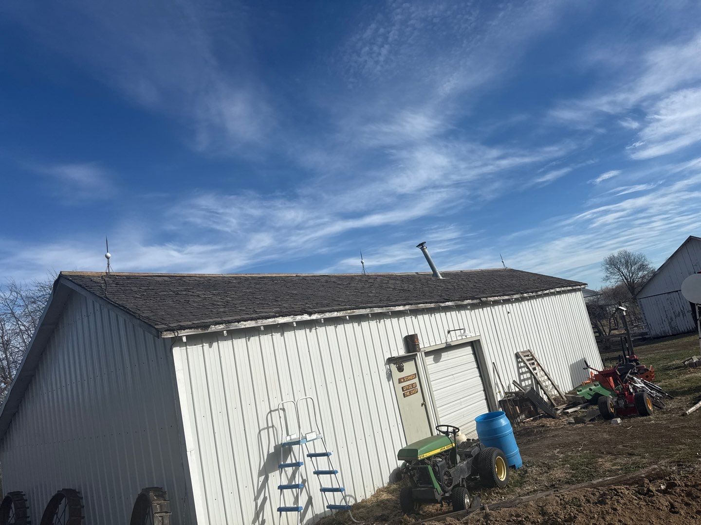 Ribbed Metal Roof Replacement on Outbuilding in Hooper, NE by Crows Roofing LLC