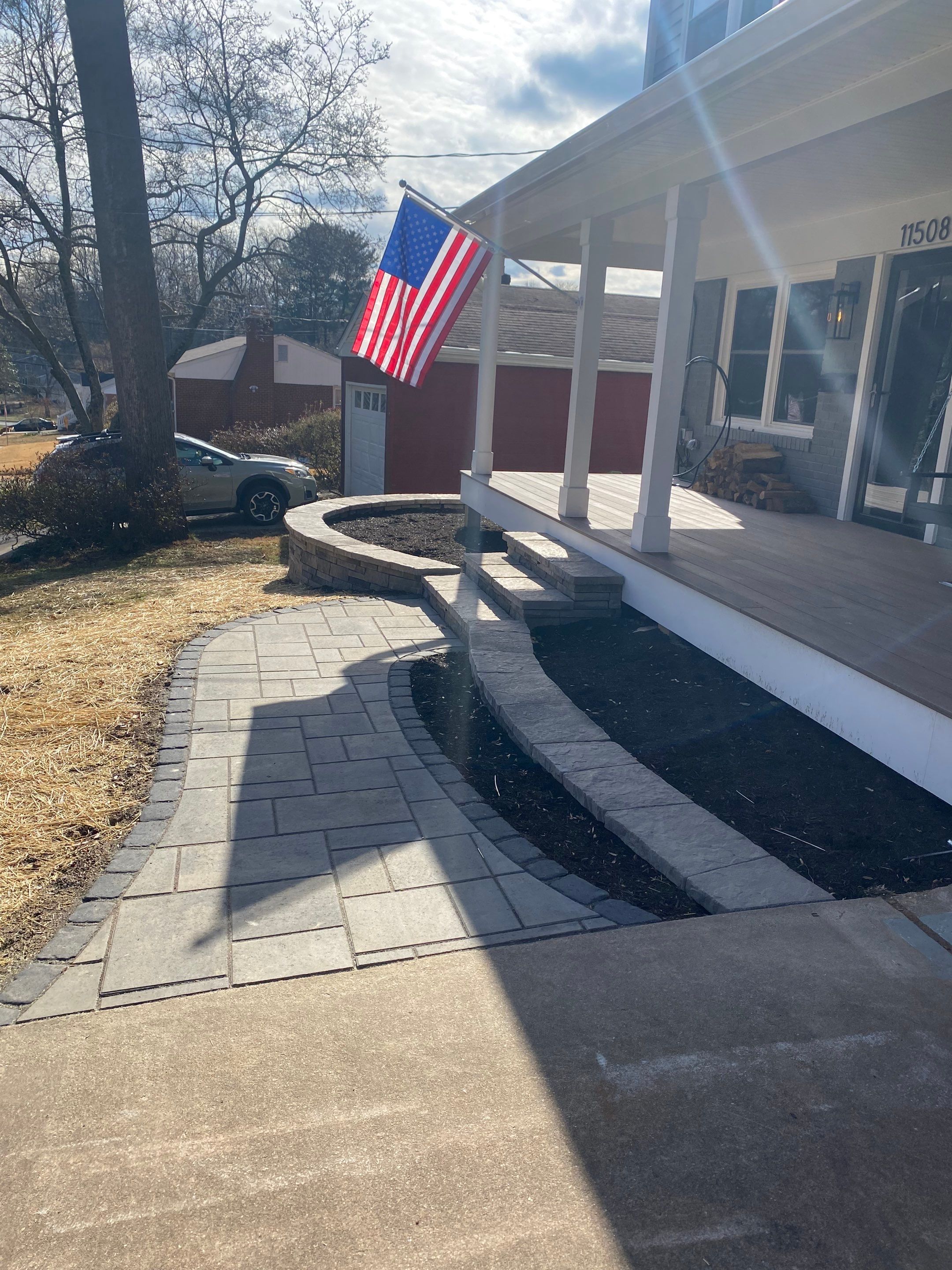 Retaining wall, walkway, small patio and landscape install by The Smet Companies, LLC