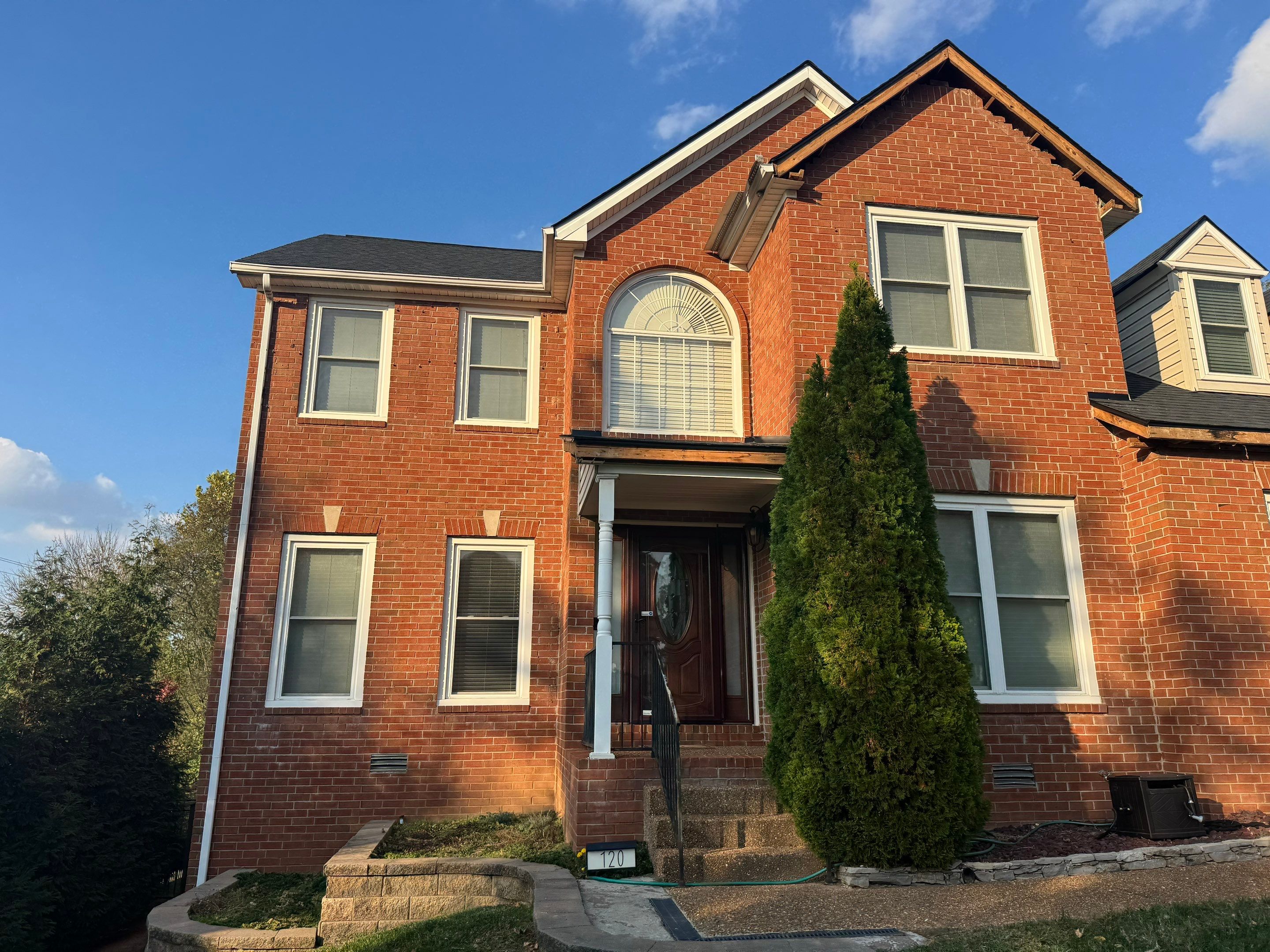 Charcoal Black Re-Roof & Gutters by Royal House LLC