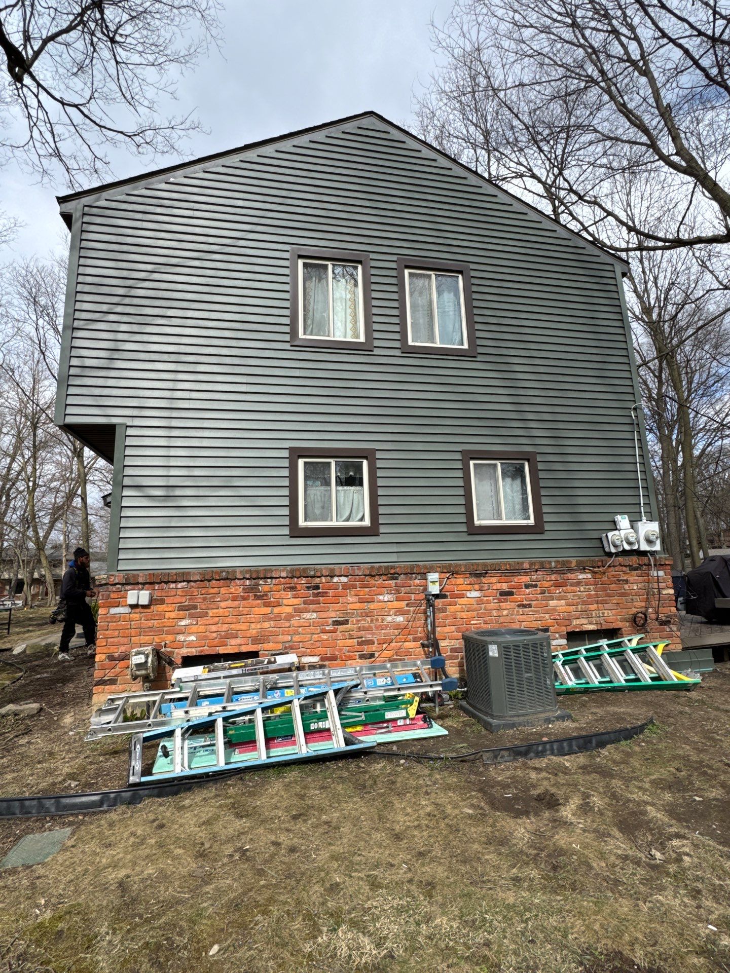 Siding Replacement using Alside Charter Oak D4.5" Deep Moss by 180 Contractors