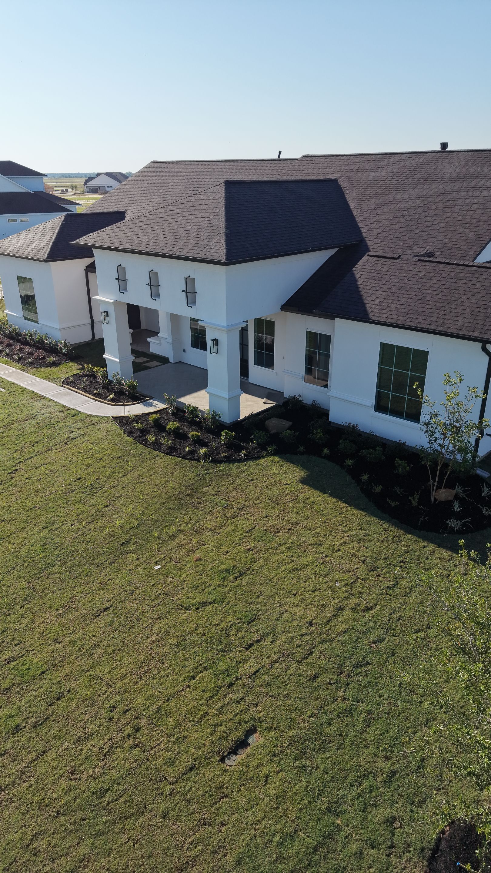 Custom Stucco Masterpiece with Precision Foam Detailing – Waller, TX by Apex Conventional Stucco Llc