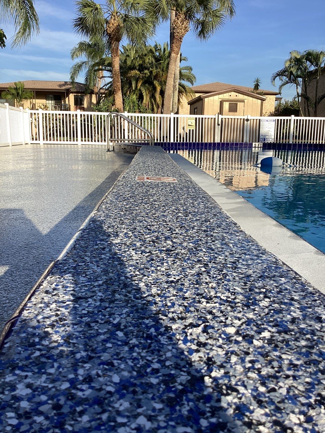Pool Deck using Orbit and Tidal Wave by Amvet concrete coatings llc