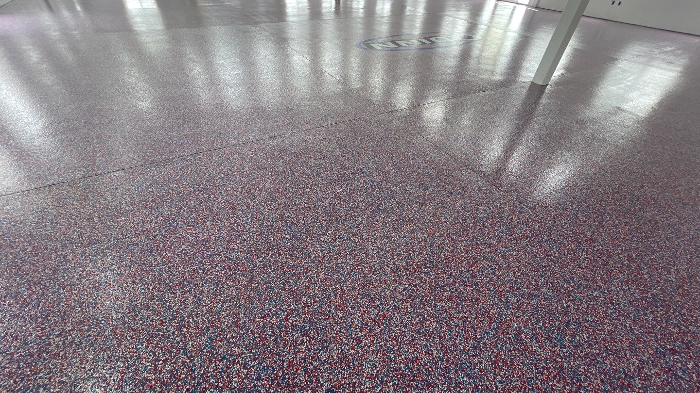 Quinn Bros Commercial TransFLOORmation by Symphony Concrete Coatings