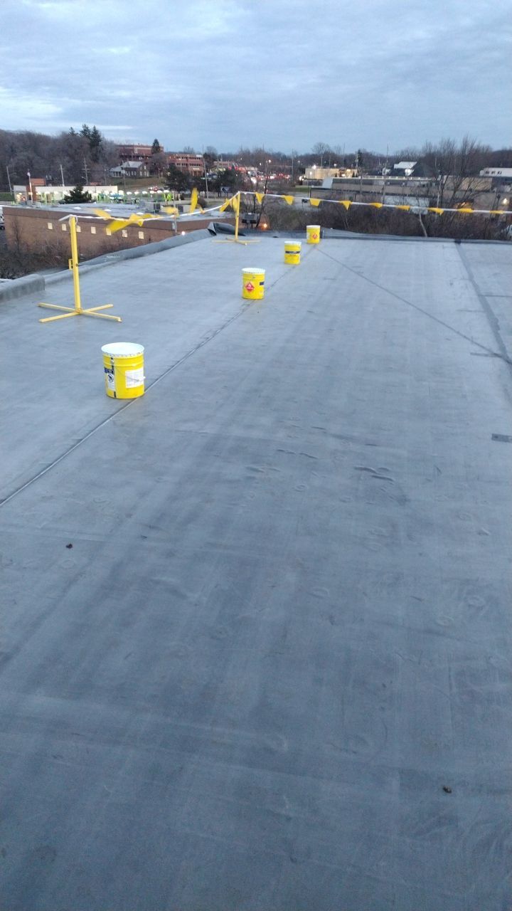 Commercial flat roof parma by Absolute Roofing and Construction