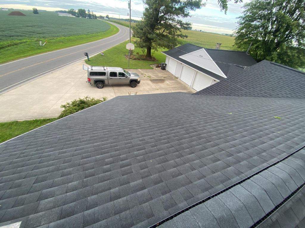 Storm damage roof replacement by Nitro Roofing and Construction