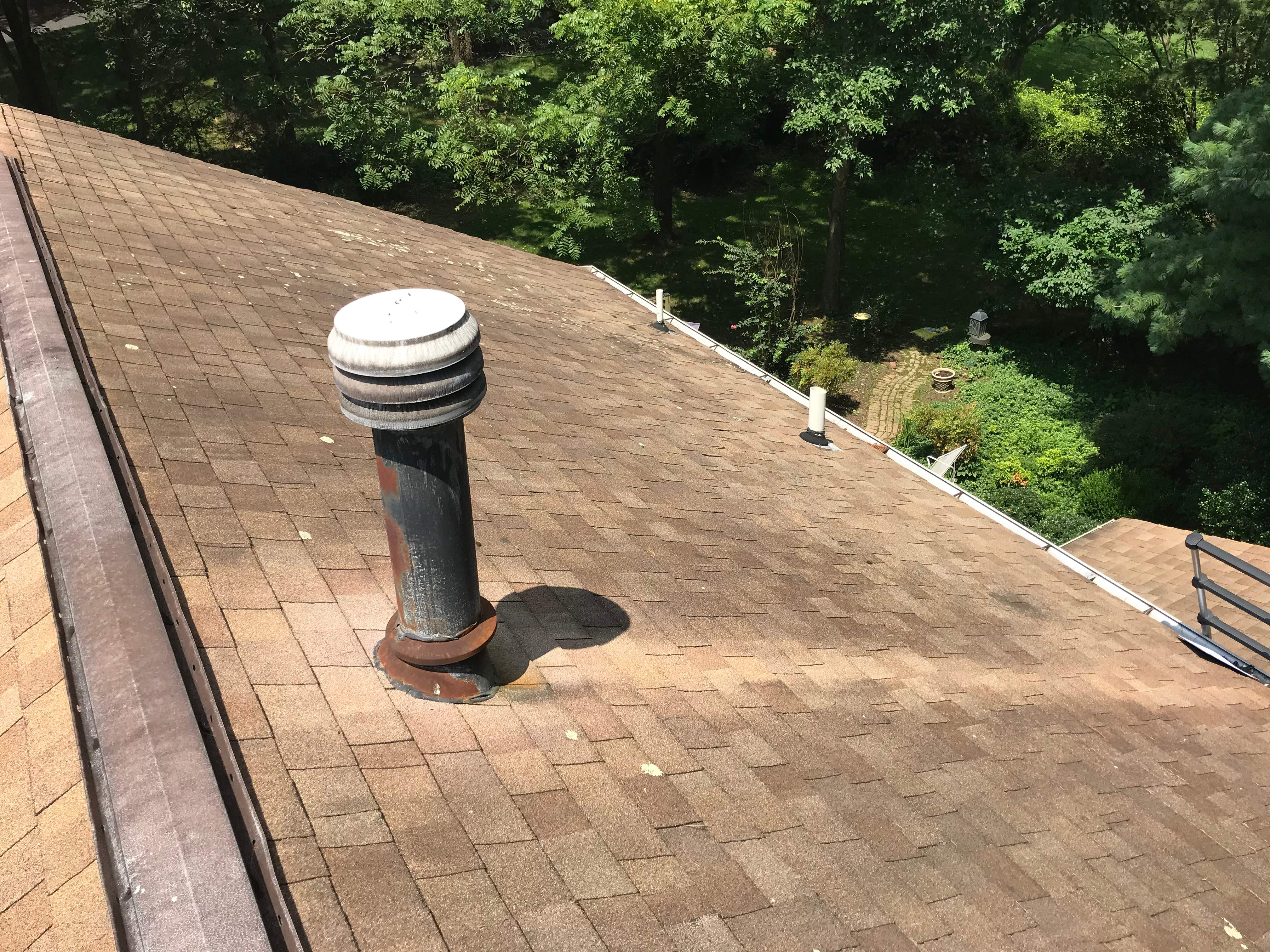 Residential Roofing Installation using Landmark Shingles Color Weatherwood by Alpha Design Services