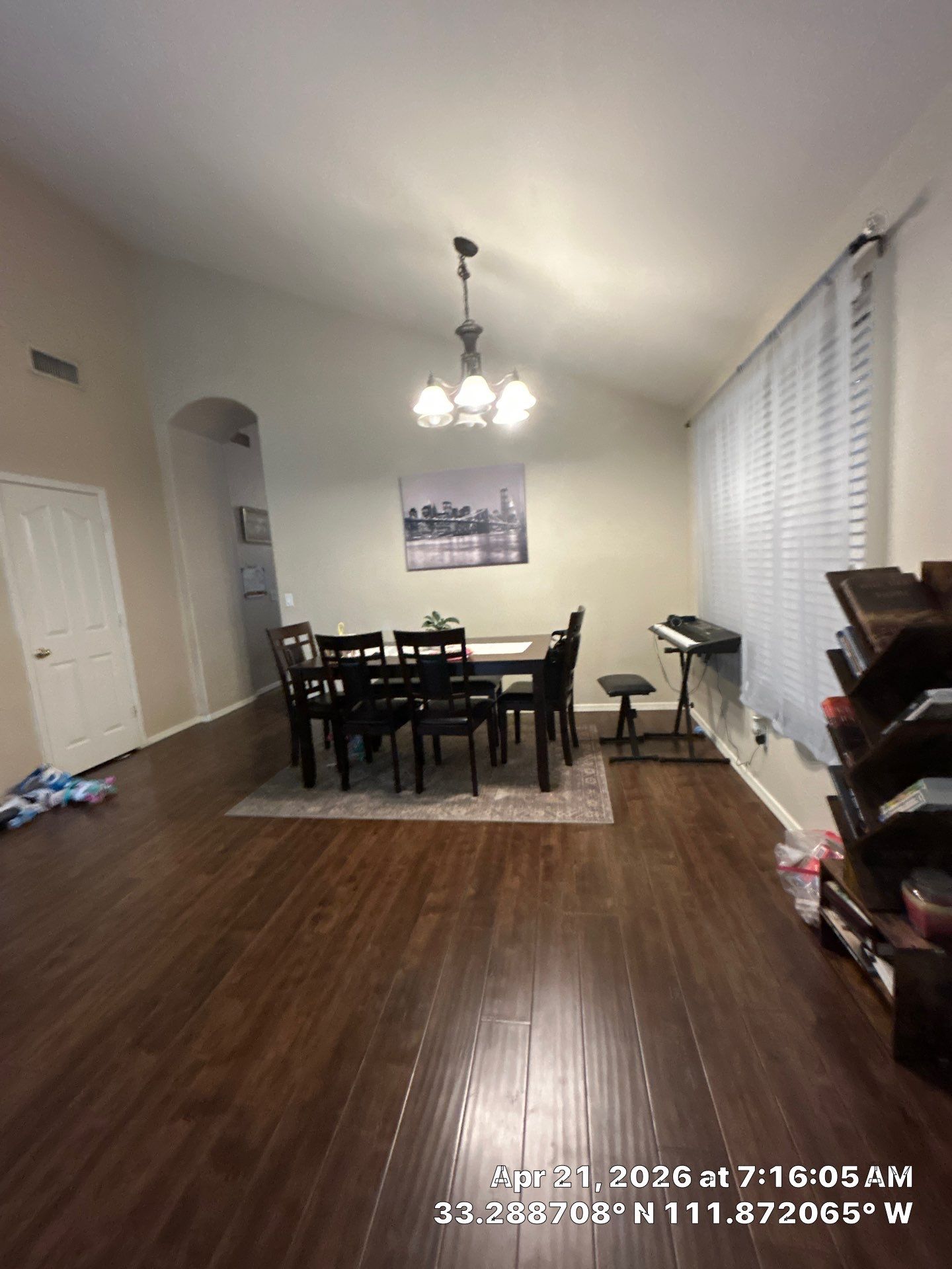 Dark Wood-Look Laminate Flooring Installation in Chandler Dining Room by CompanyCam Sales Demo