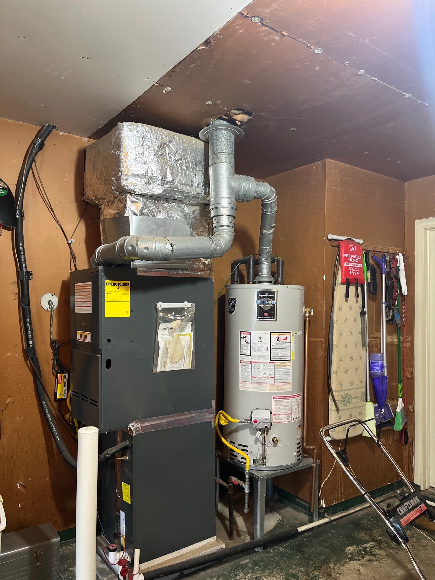 Furnace Exhaust, Water Heater Exhaust, and Roof Repair from fallen tree by Premier Chimney and Roofing