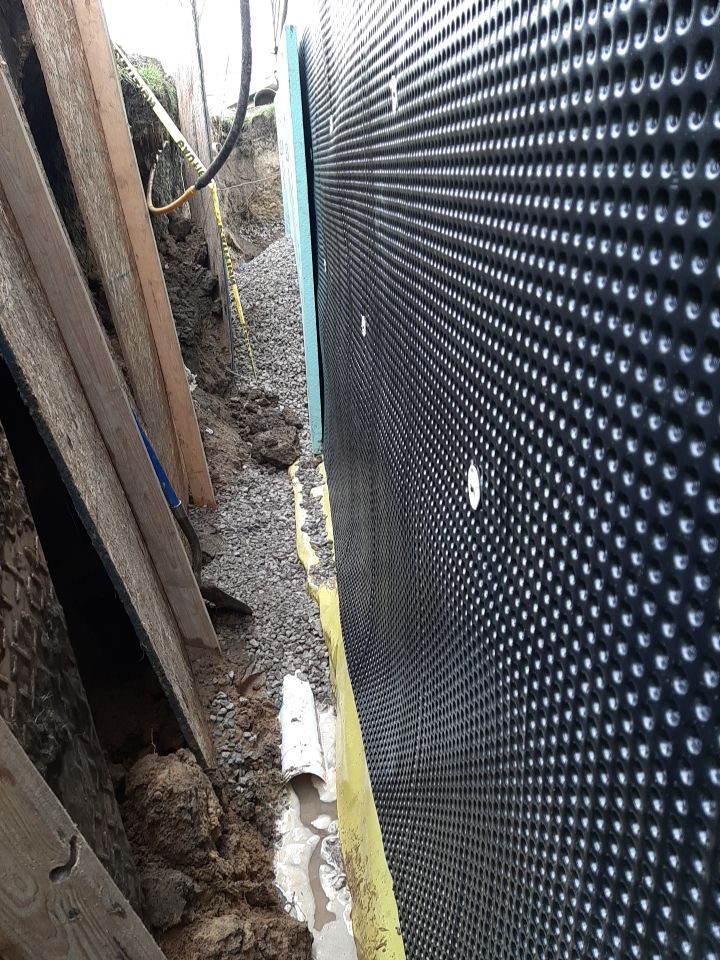 Wall Straightening and Reinforcement using Embedded Fiber Reinforcement by Toledo Basement Repair 