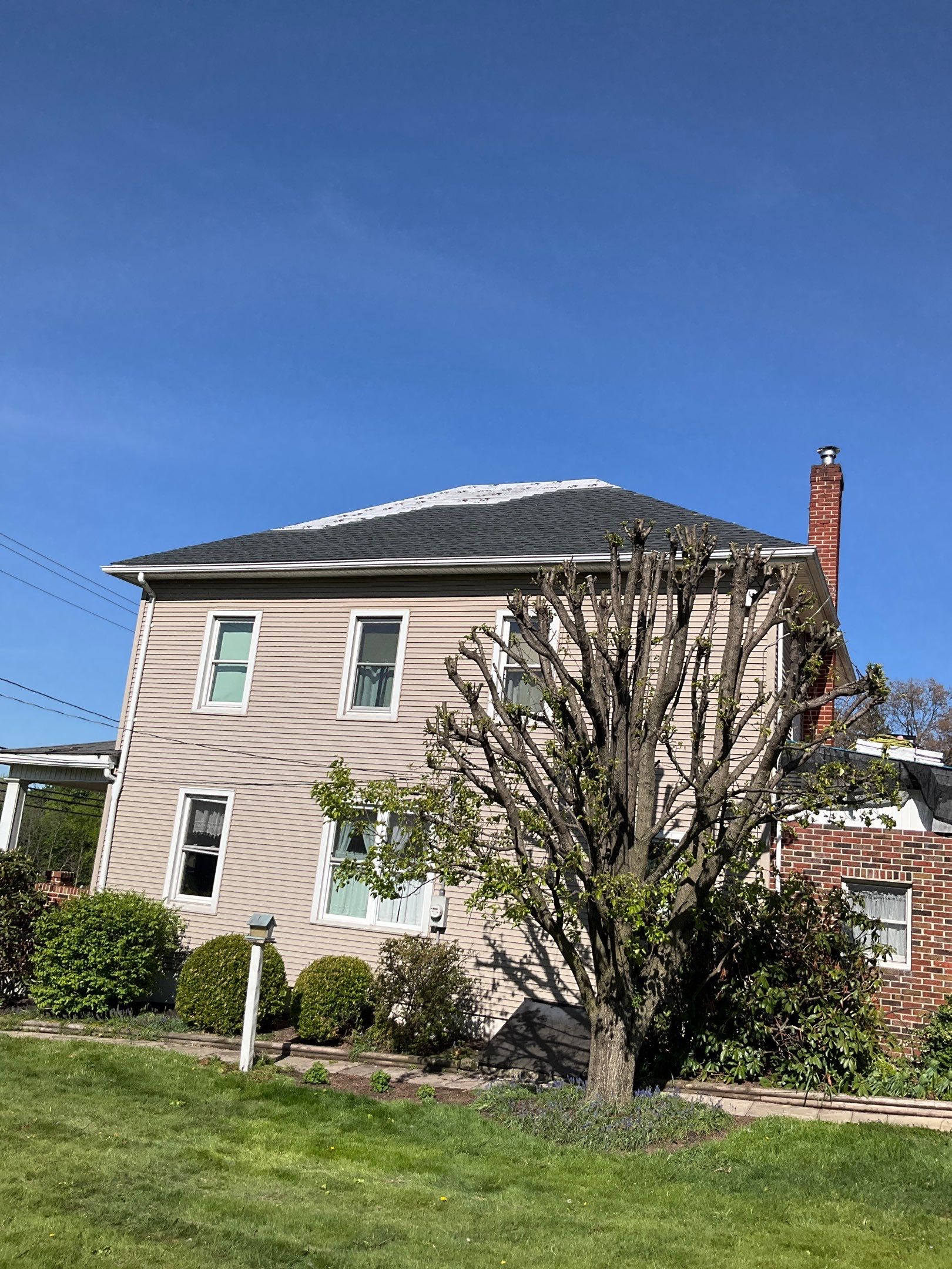 Architectural Shingle Roof Replacement and Skylight Integration in Hegins by Esh Builders