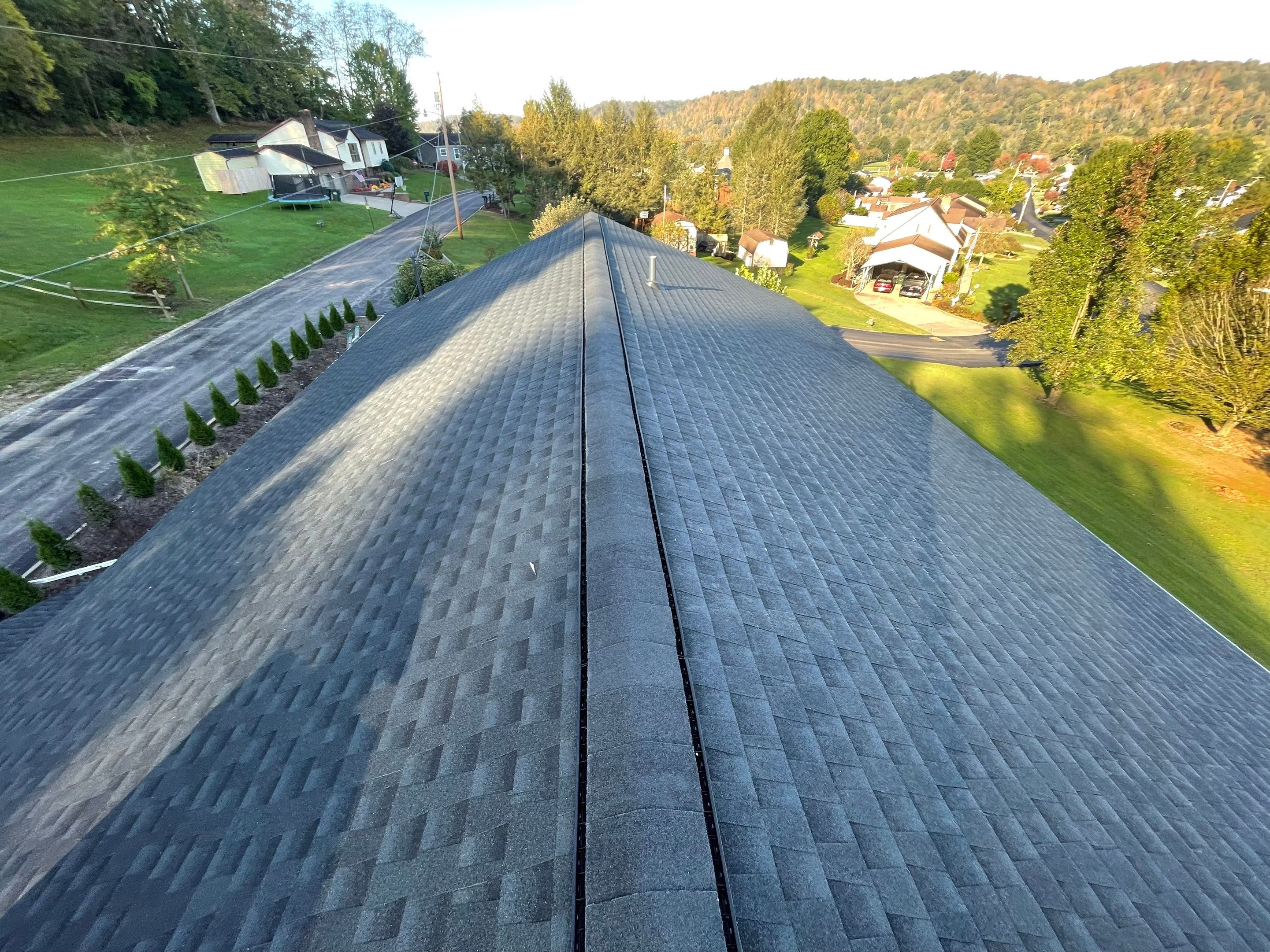 Residential Roofing Installation using GAF Timberline HDZ, Black by Rainstoppers Roofing