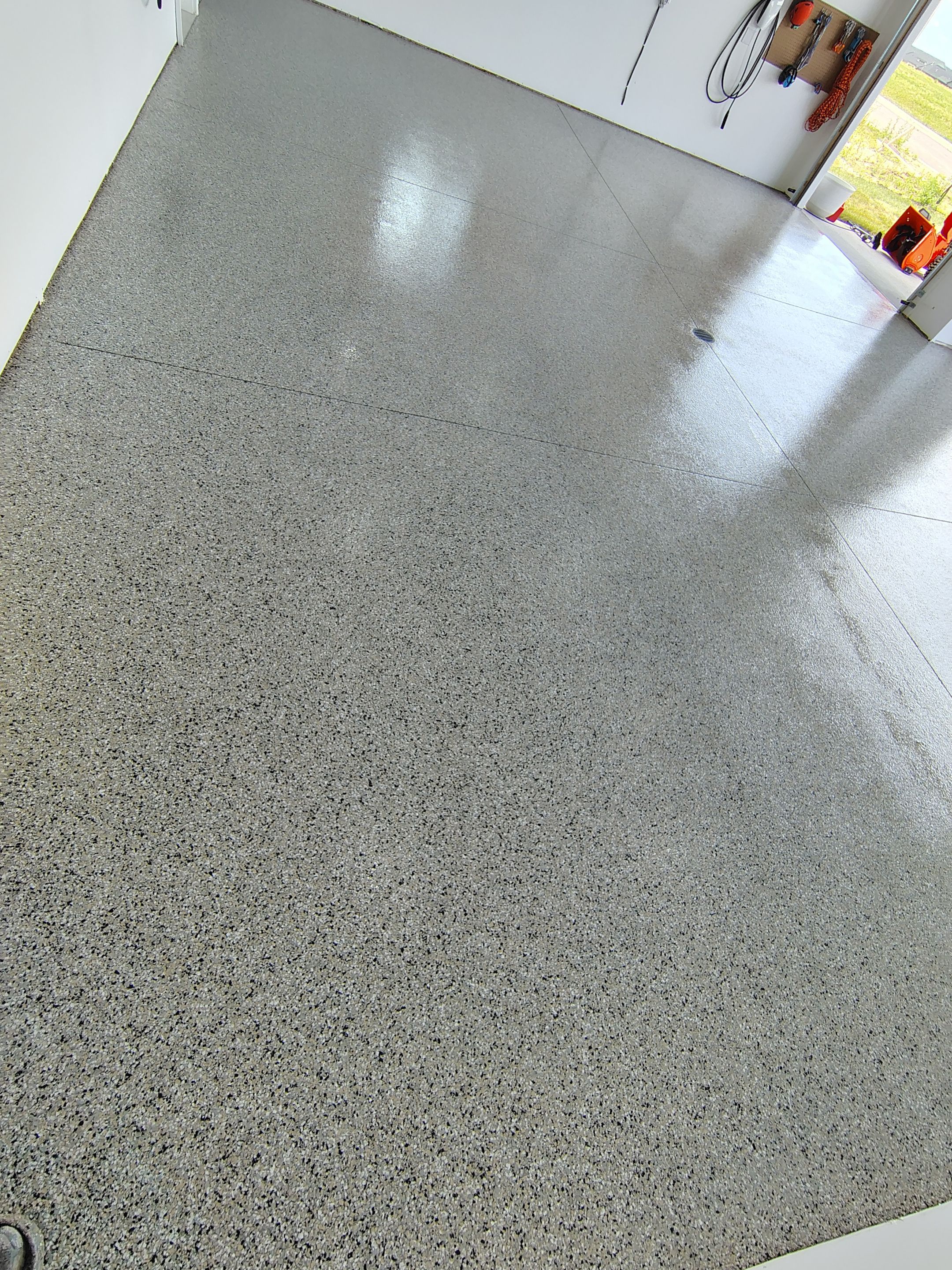 Gray and White Speckled Epoxy Garage Floor Coating in Tea by Select Painting, Coatings & Garage Cabinets