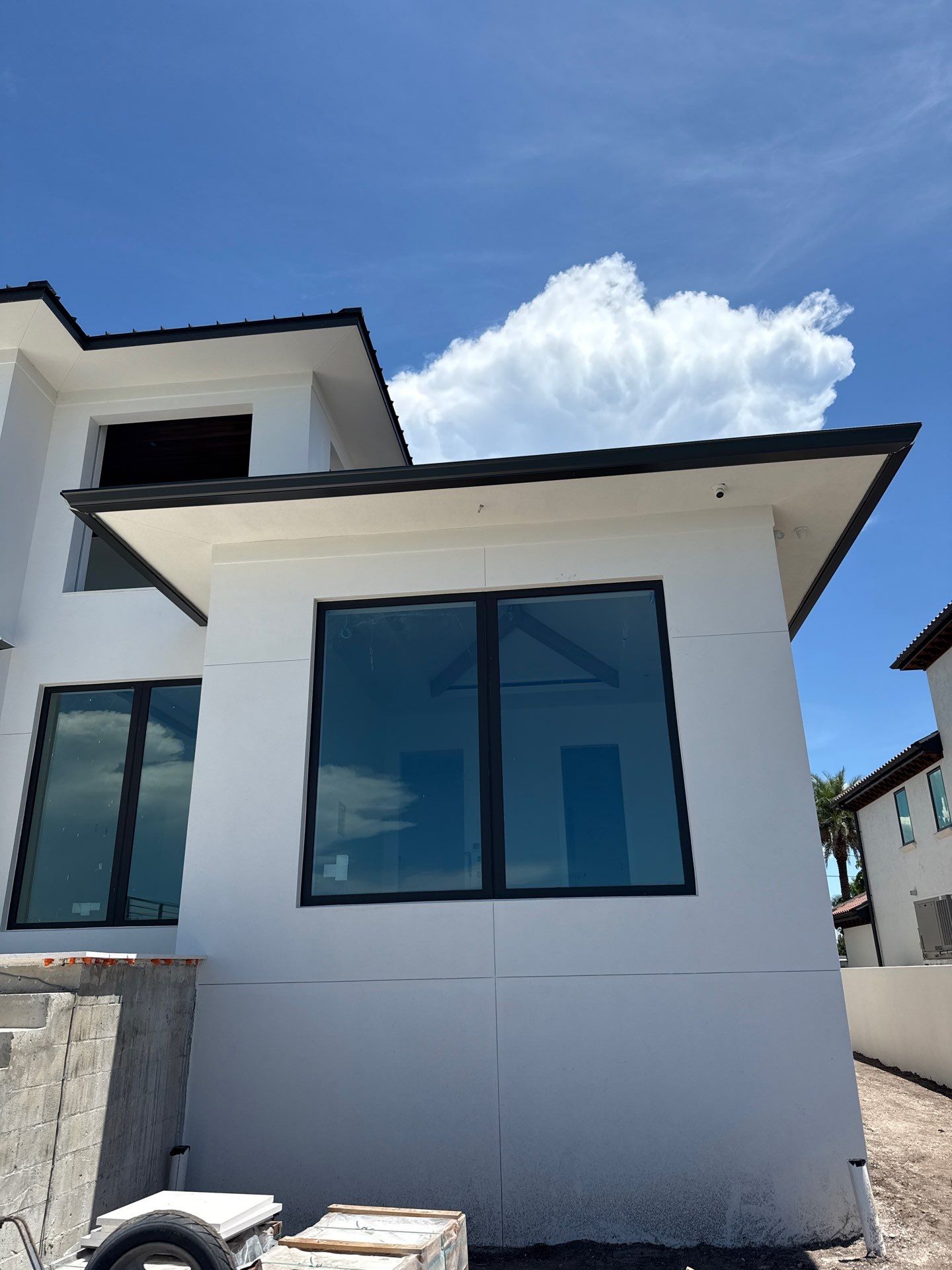 Seamless Aluminum Gutter Installation using black seamless gutters in Sarasota FL by Gutter Professors