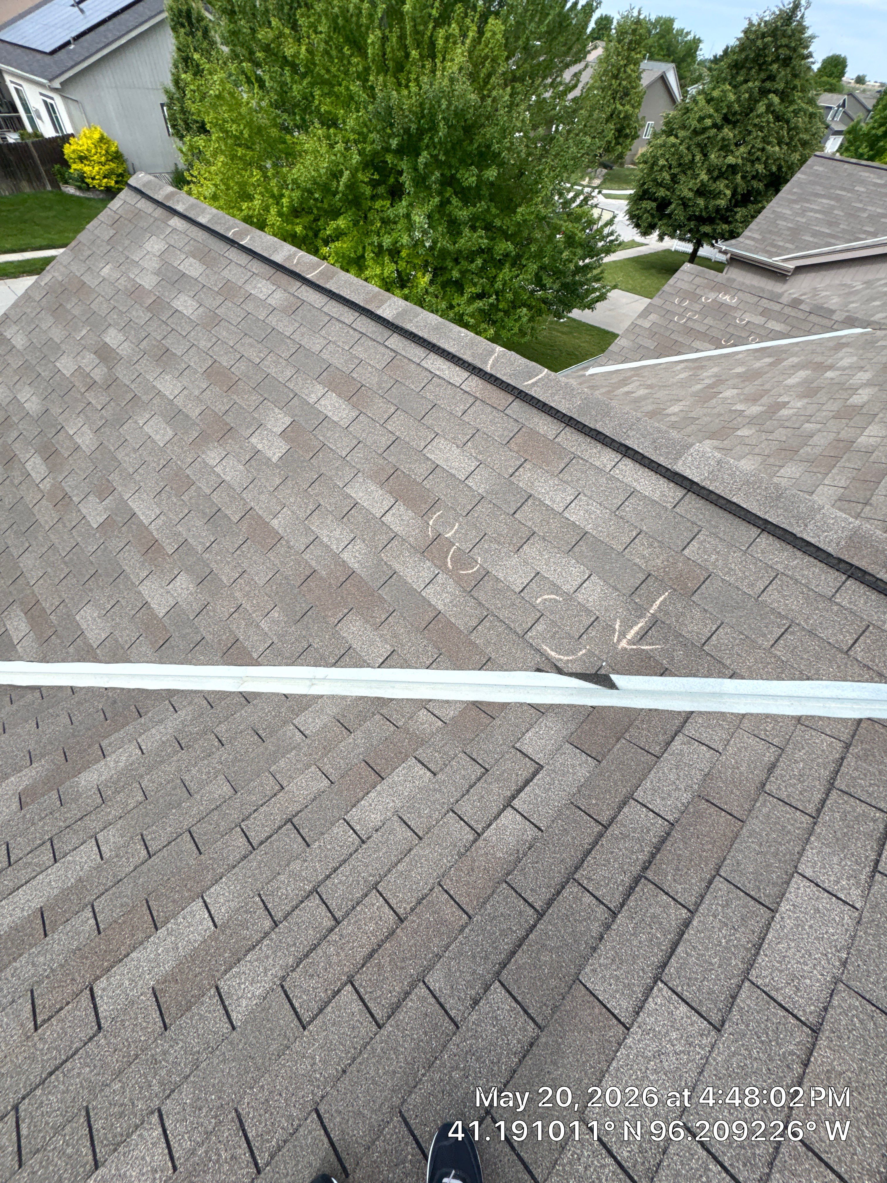Storm Damage Restoration for Residential Asphalt Shingle Roof in Omaha by Crows Roofing LLC