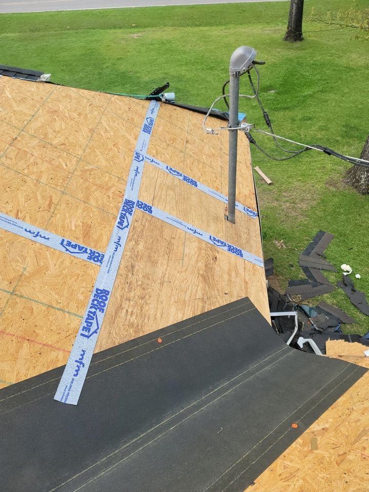 Residential Roofing Installation using Roof Replacement by American Roofing & Construction LLC