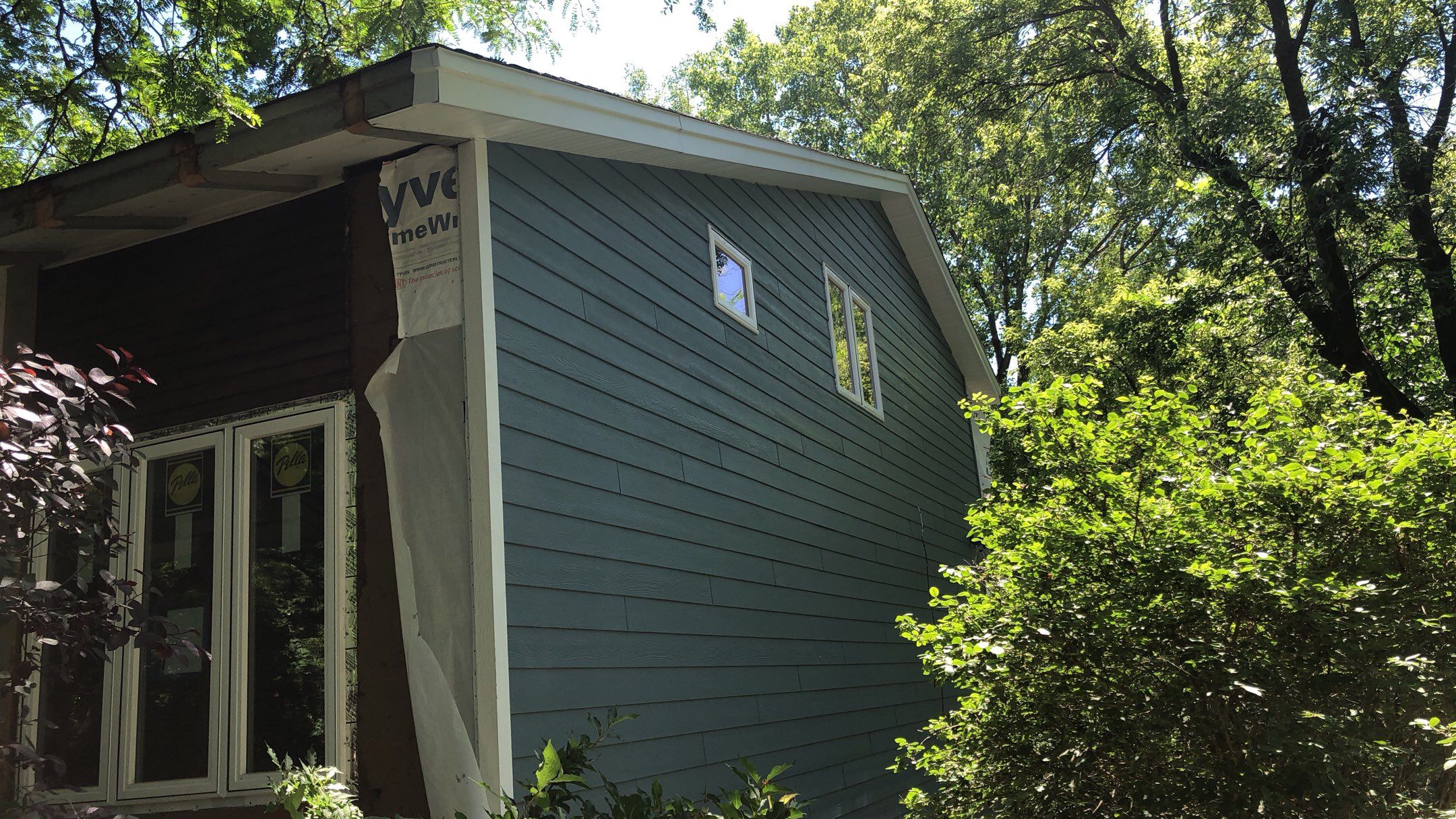 Siding Installation using LP SmartSide and Pella Vinyl Windows by MODERN EXTERIOR SYSTEMS