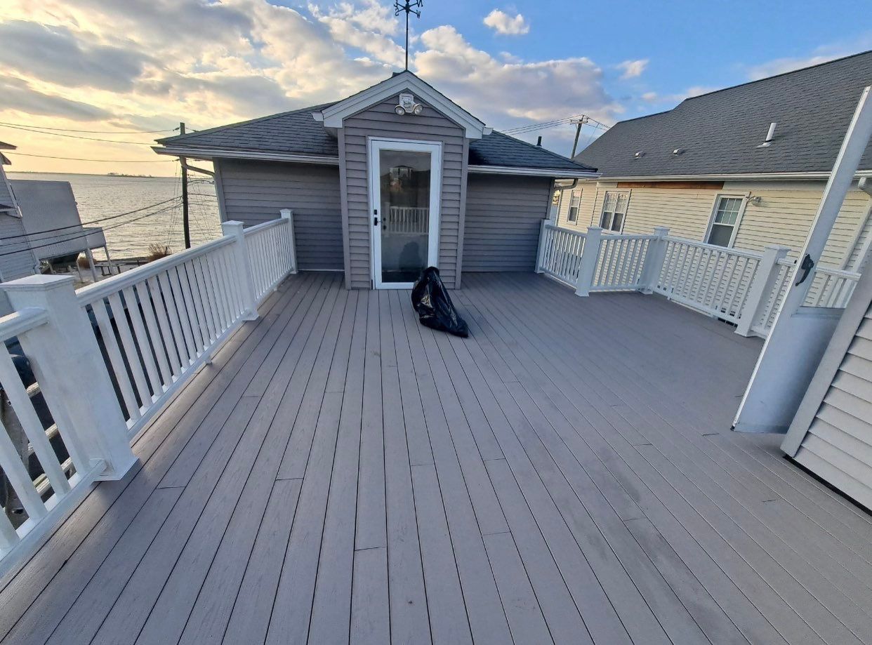 Deck Installation using trex over epdm roof by A Plus Exterior