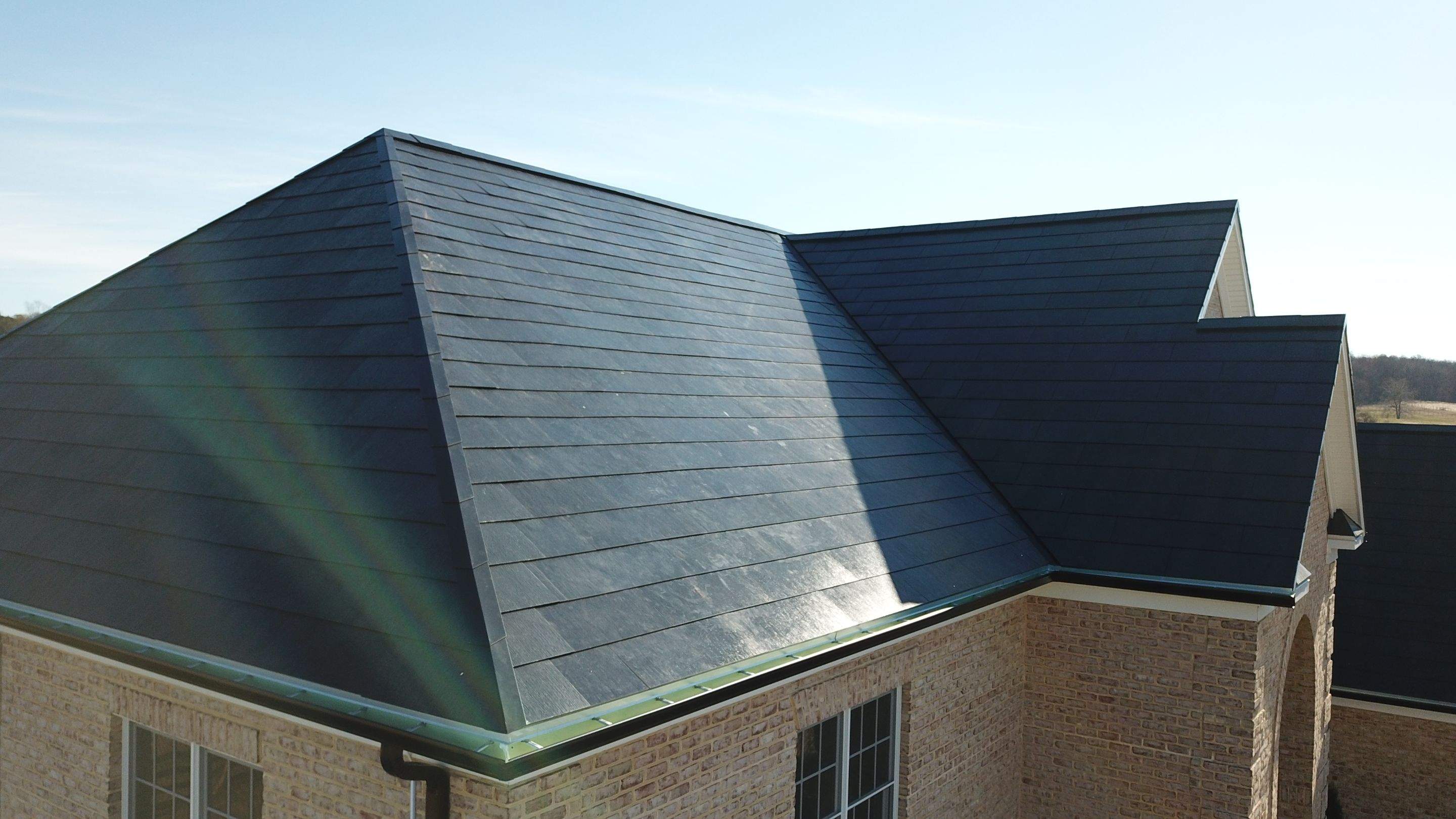 Tesla Solar Roof Replacement  by American Home Contractors