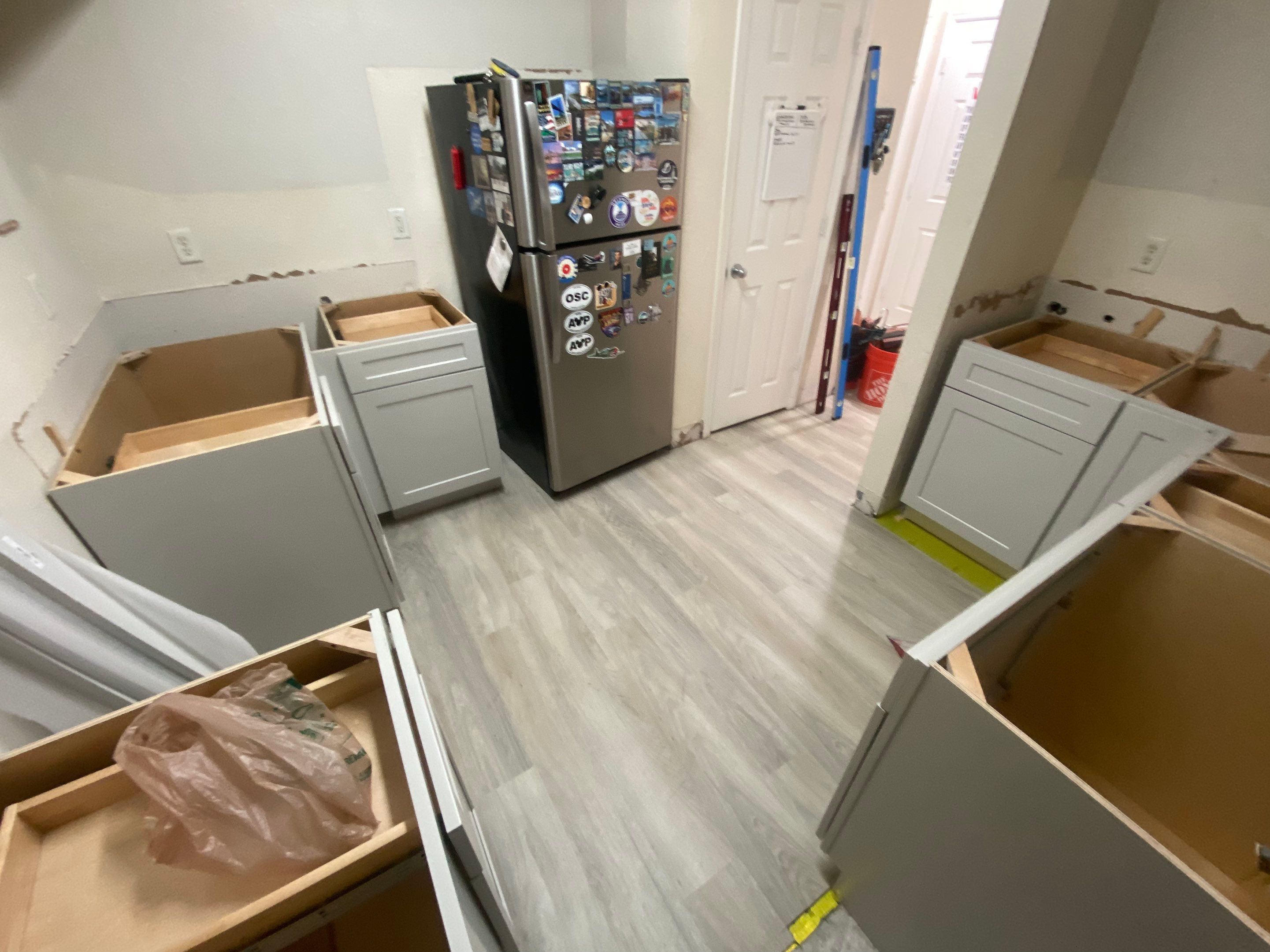 Home Remodel using LVP Flooring and Cabinets by HandyMangum