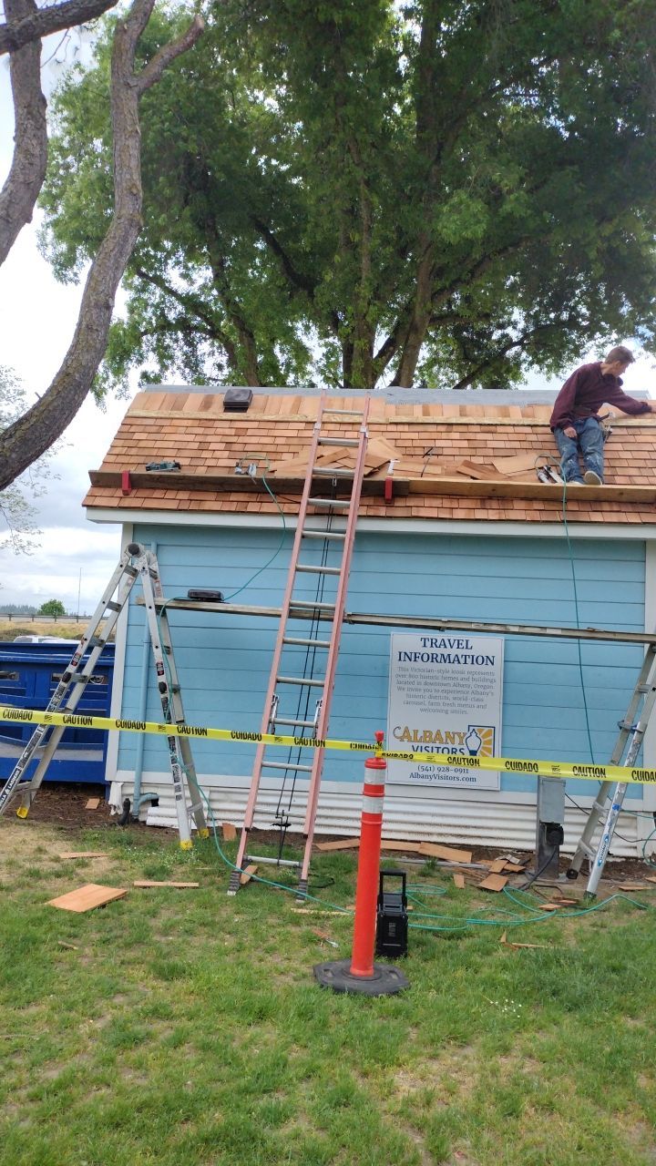 Cedar Shake Install using #1 Blue Label Cedar Shingles for the Albany Visitors Association  by Orezona Building & Roofing Company, Inc.