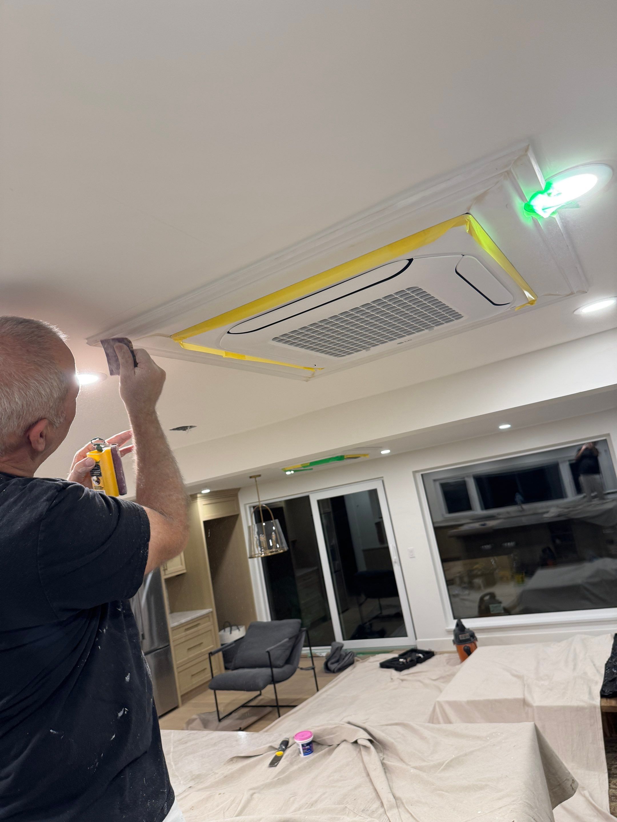 West Vancouver Custom Millwork: Heat Pump Trim & Window Finishing by YVR Construction Group