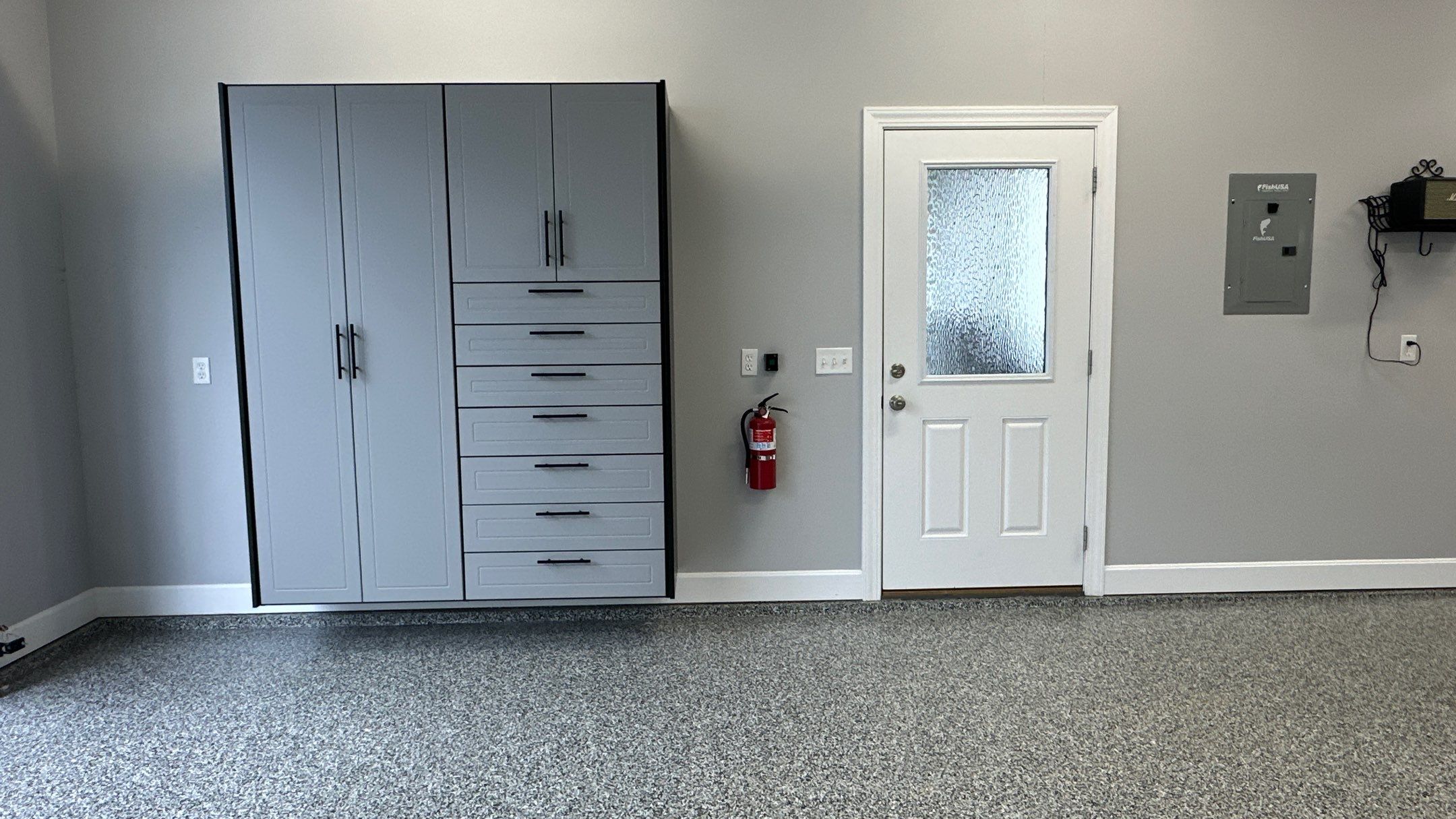 Pat F upgraded his garage with a cool Two-tone cabinet setup by Banner Garage