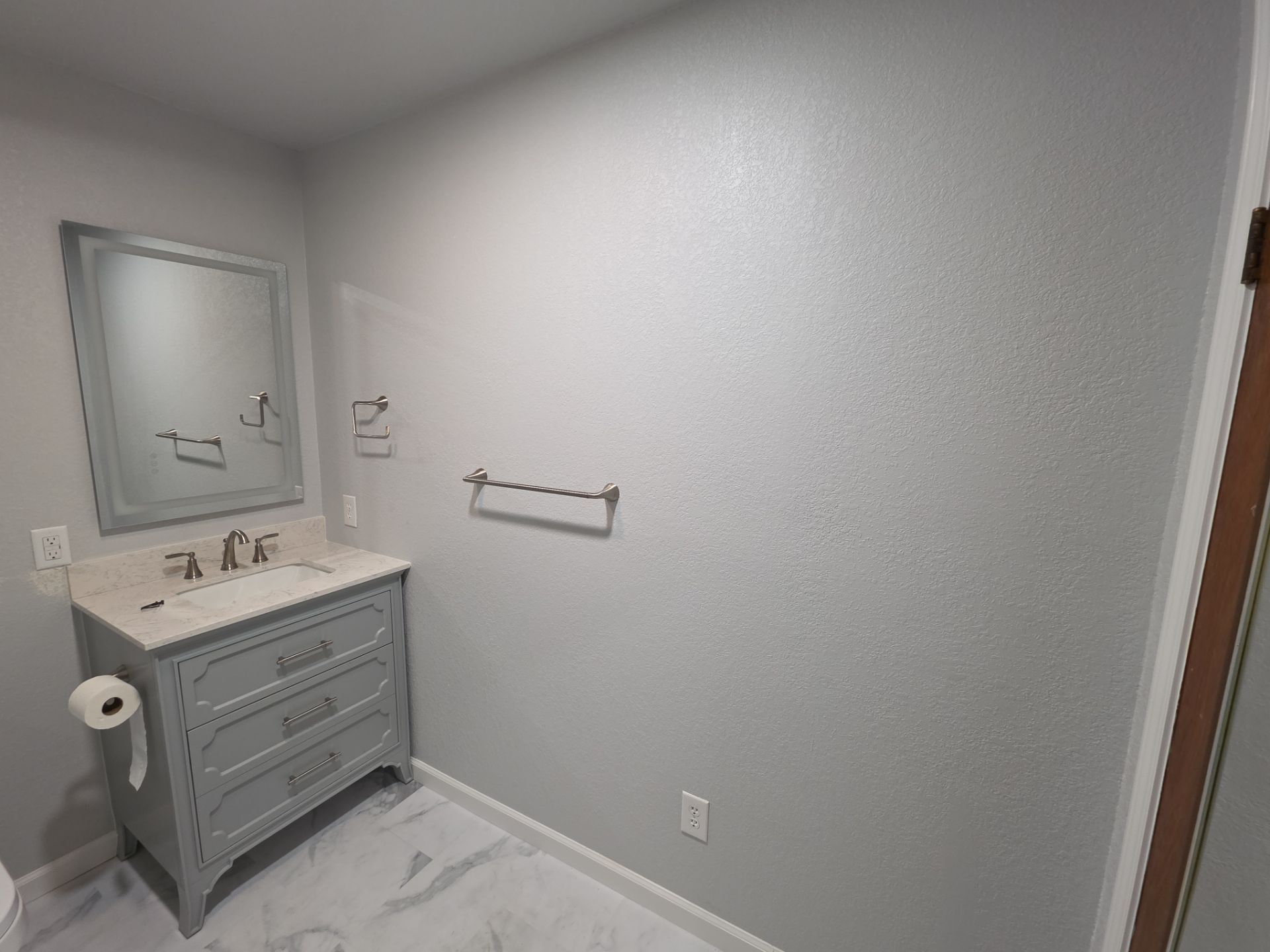 Bathroom remodel by In & Out Construction & Remodeling, LLC