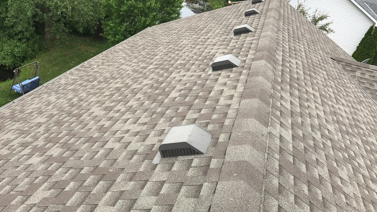 Storm Damage Restoration using Atlas Pinnacle Shingles and Mastic Vinyl Siding  by MODERN EXTERIOR SYSTEMS