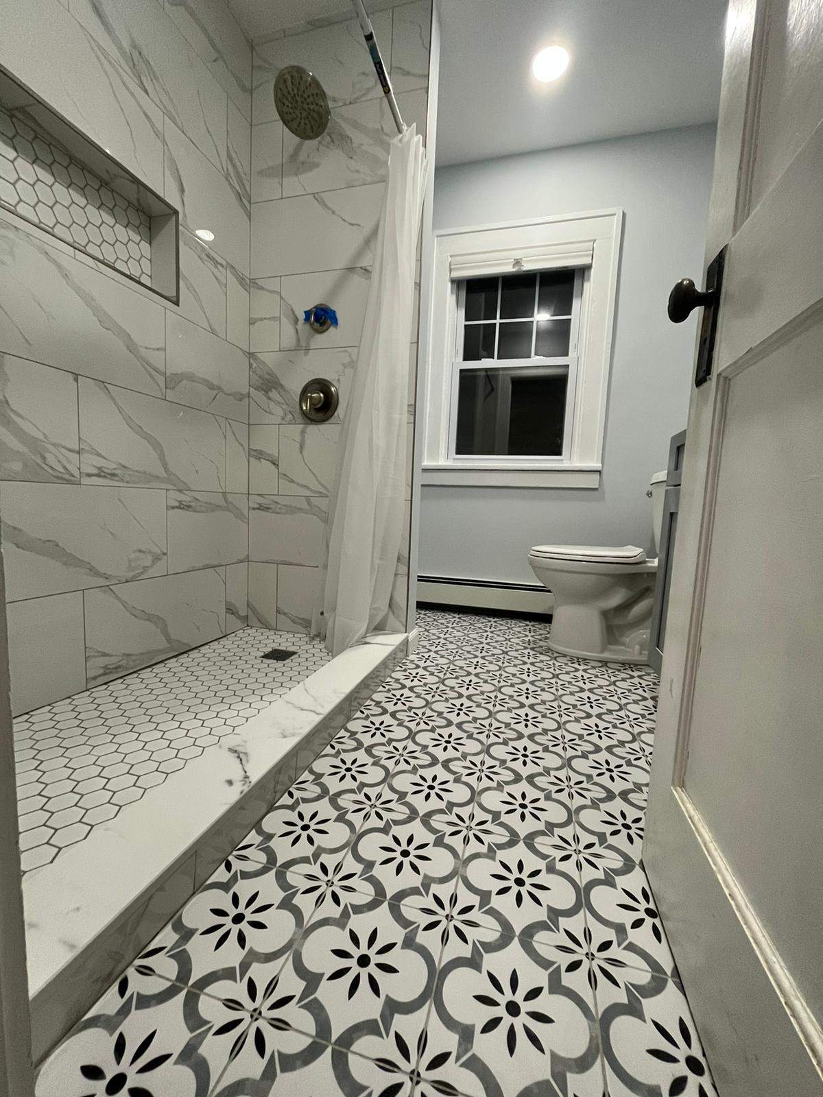 Bathroom Remodel using Tile by Home Concepts Construction
