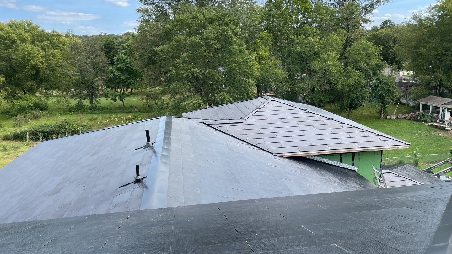 Tesla Solar Roof  using Tesla Solar Roof V3 tiles by American Home Contractors