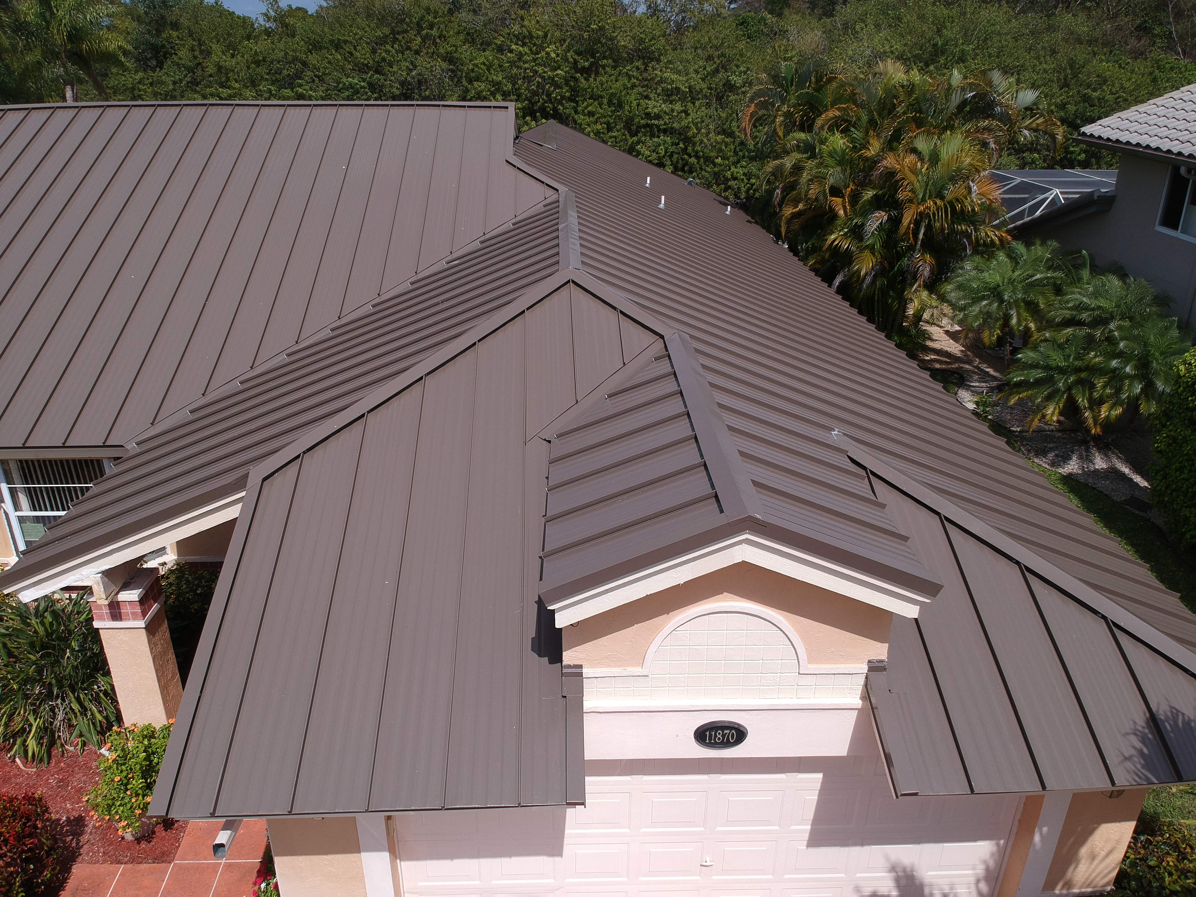 Residential Roofing Installation using 1" Nail strip metal roof by BLUES BROTHERS CONSTRUCTION CORP