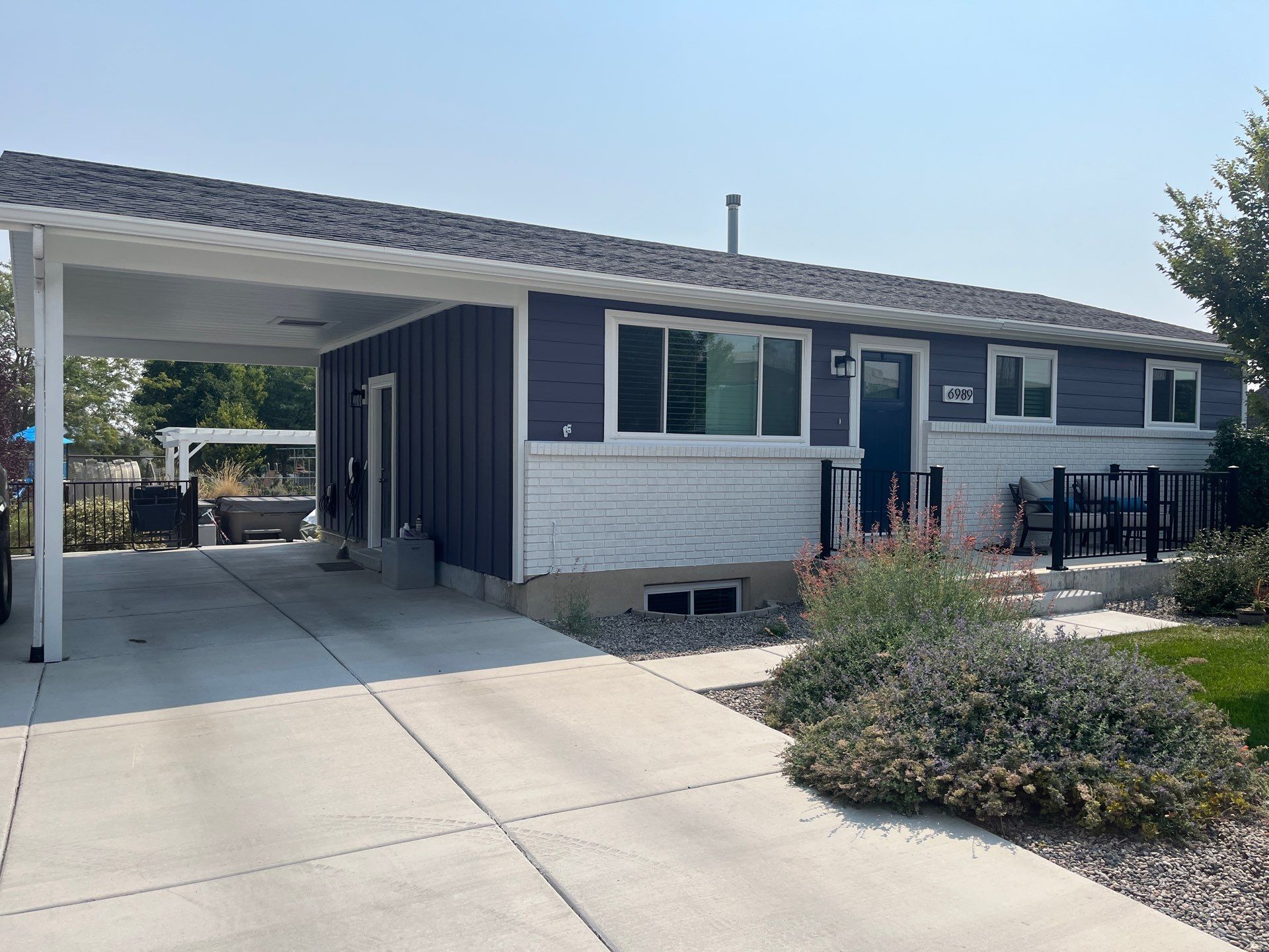 West Jordan | Custom Painted Hardie Upgrade | SW Midnight & Arctic White by Ideal Siding Utah