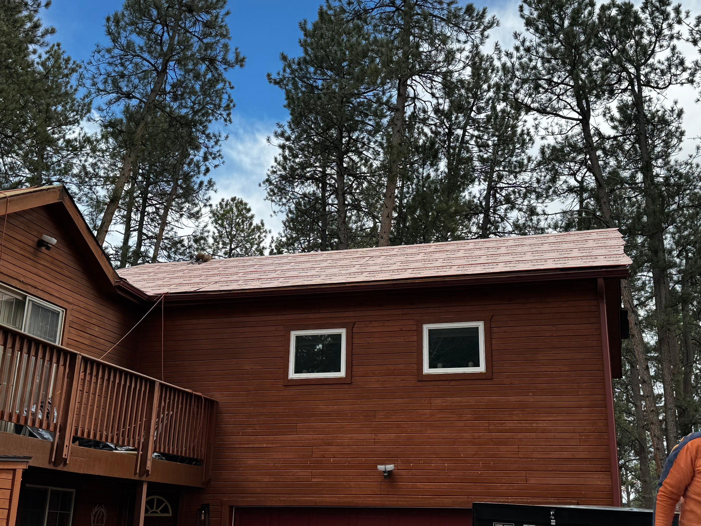 Residential Roofing Installation using Standing Seam Metal by Blue Peaks Roofing LLC 